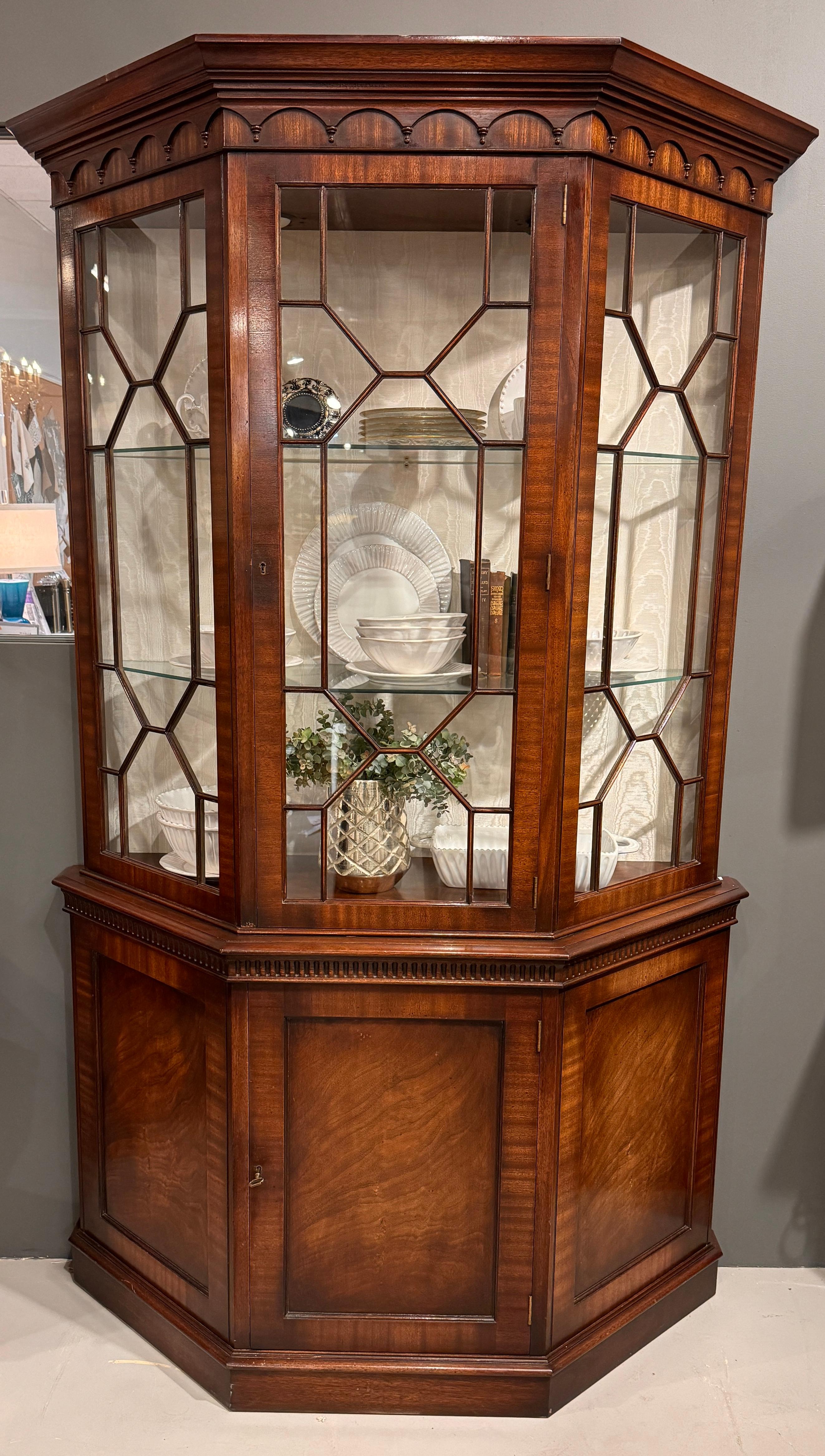 Elevate your living space with the timeless elegance of our Georgian-style display cabinet made in England. Crafted with meticulous attention to detail, this exquisite piece embodies the grace and sophistication of 18th-century design.

The cabinet