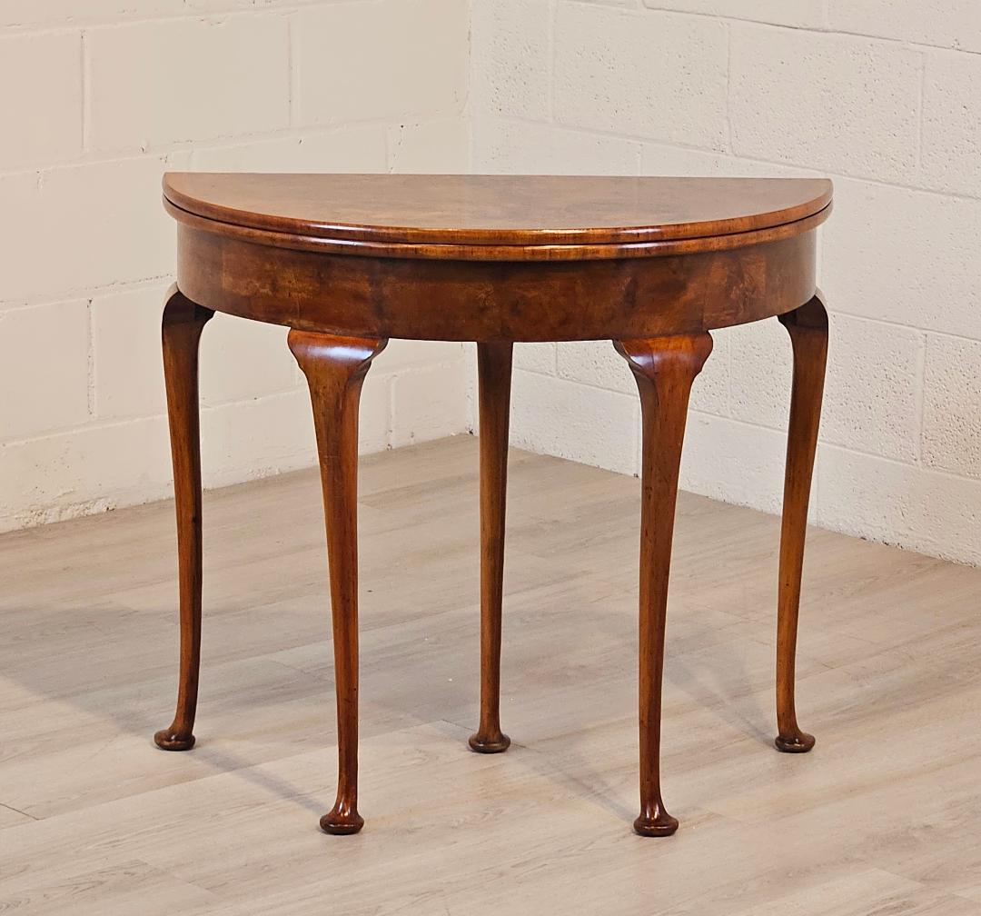 A lovely Walnut Burr Flip Top Console Games Table that is at home against the wall or out as the centre of attention. Flip the top open and you have a blue baize top ready for a quick game of bridge, or maybe a puzzle.  When you don't need it, leave
