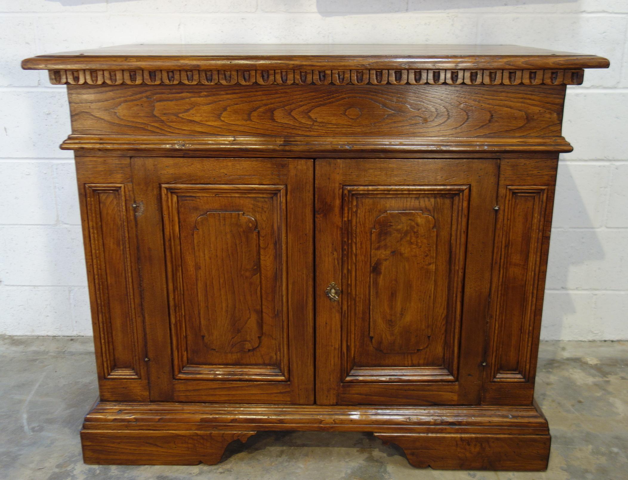 “MAGGIORE” Credenza - The Italian Art & Handcraft of Fine Antique Reproduction

“Maggiore” 2-door Credenza, with (or without) Renaissance dentil detail:

Measures: 43”W x 35”H x 24”D (each door measures 14”W x 22”H x 1.65” thick, front pillars each