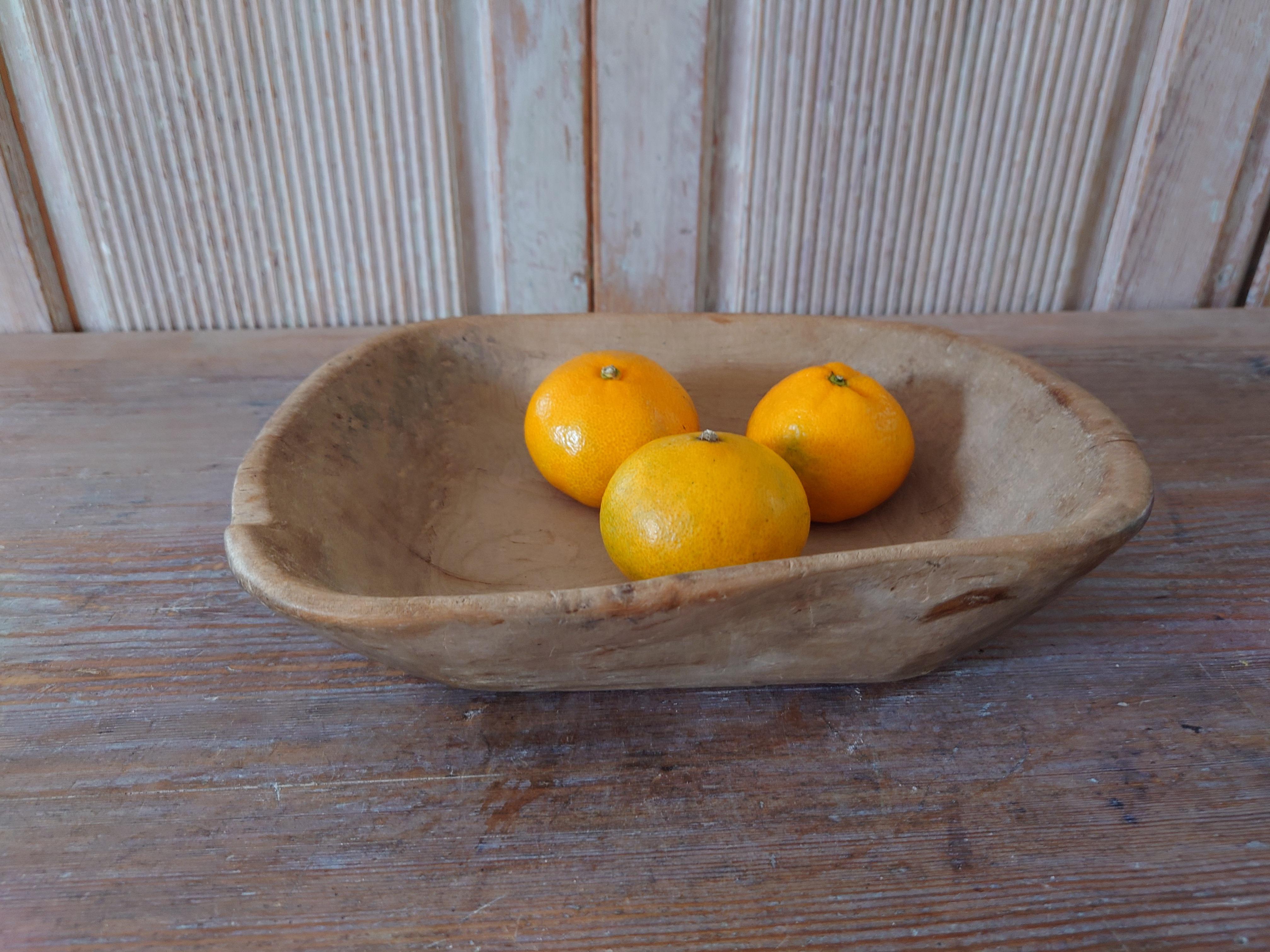 An antique and genuine organic wooden bowl with nice patina from Northern Sweden
With highly appealing patina.
Ownermark sign  MMS  ,& dated 1793 below.
Beautiful in any room,a real centerpiece.
You can see the use of time.
Drycrack occour
The bowl