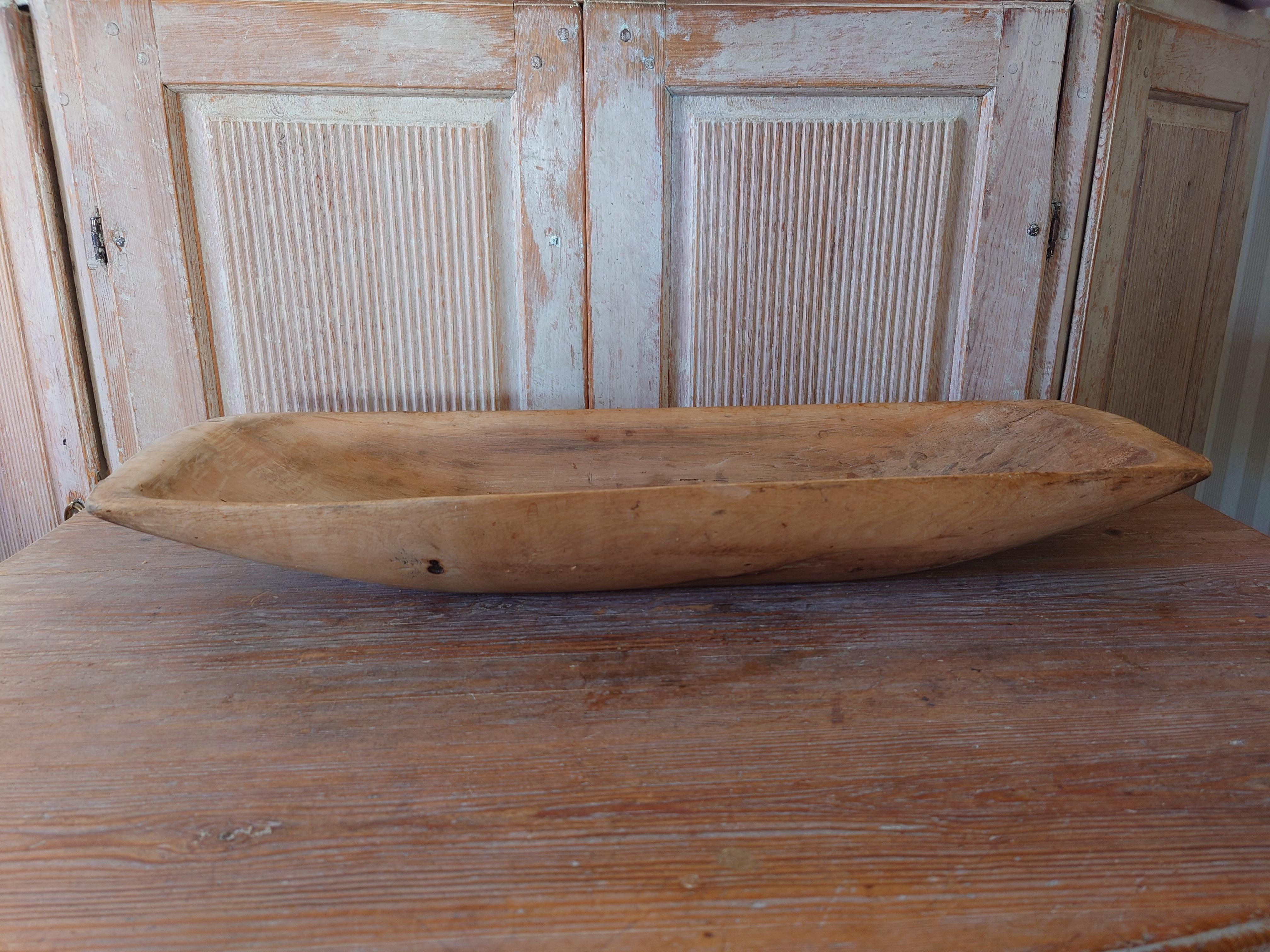A genuine antique wood trough dated 1789 and signed with ownermarks PPS OIS ,from Hälsingland Northern Sweden


A nearly monumentaly large farmers handcrafted form or trough/ serving bowl or centerpiece. In solid pine wood. A highly functional