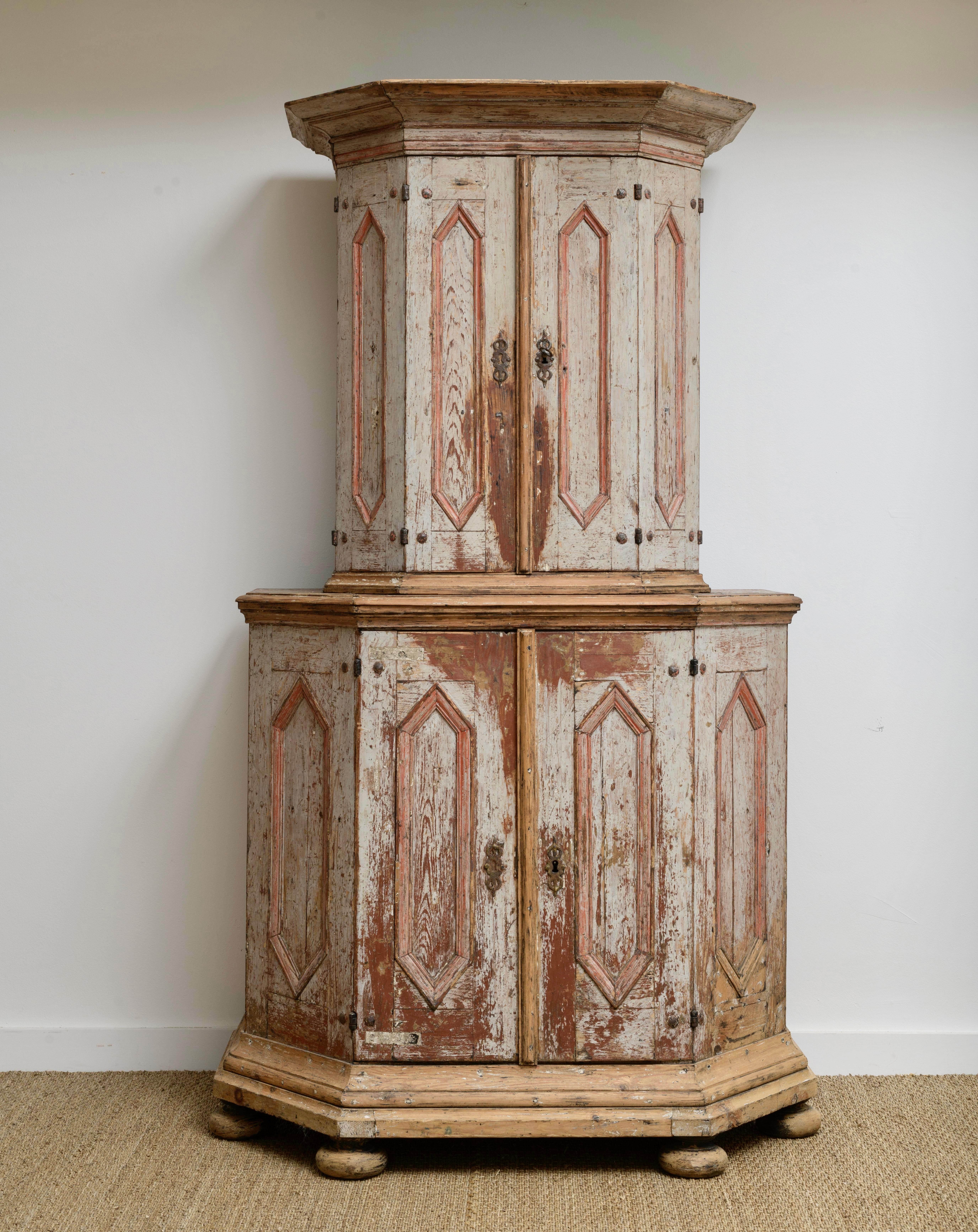Ca.1750 Swedish baroque cabinet on cabinet with origin paint in the tones of Grey and light red color.  
this piece has not been dry scraped but has paint loss through use since it was made.  Wonderful articulating upend doors with original hardware