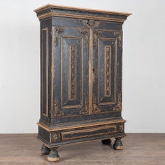 18th Century Swedish Black Painted Oak Armoire with Carved Putti and Lion Heads
