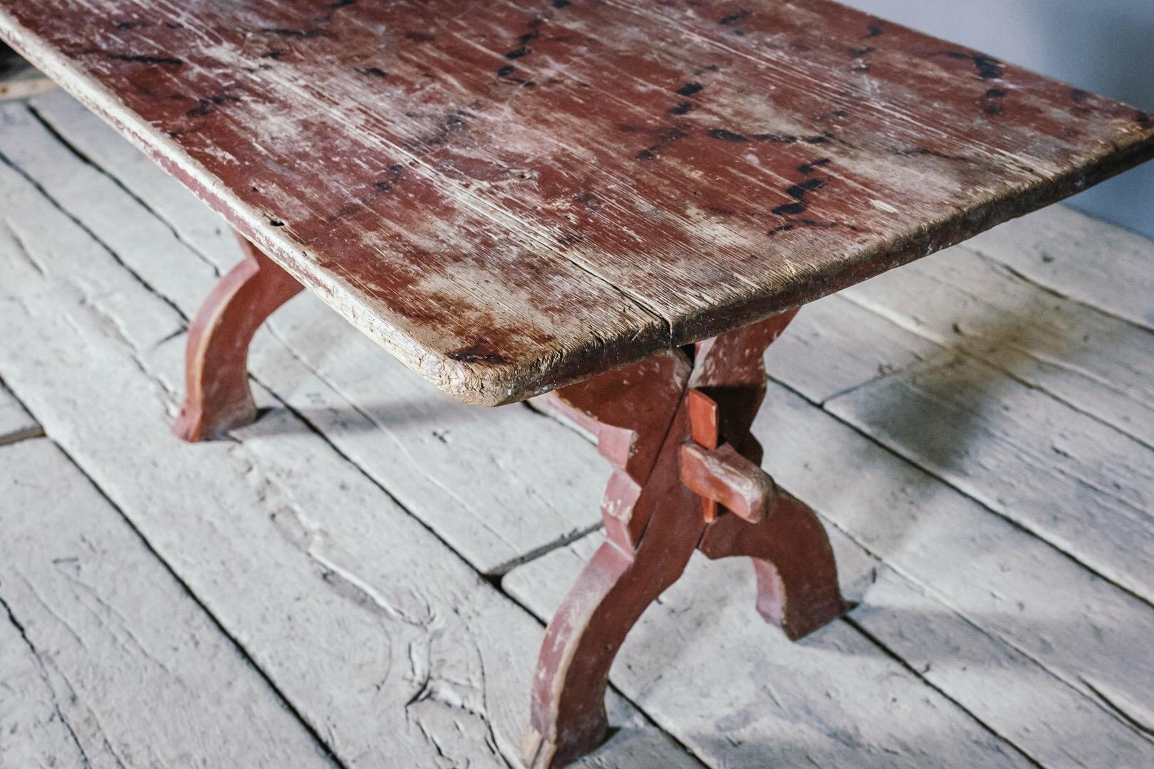 Extraordinary X frame bock board table, found in its original painted decoration. Expected worn surfaces wonderful patination. Halsingland, Sweden.
