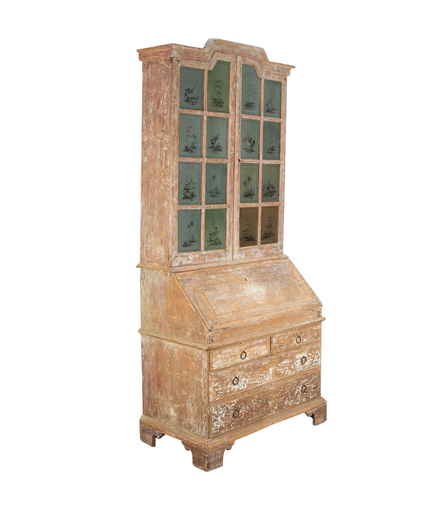 Late 18th Century Swedish Chinoserie secretary of elegant scale and proportions. 
With decorative pediment and doors with original glass. 
Painted chinoiserie decoration to all sixteen panes of glass. 
Fall front desk opening to a work space and