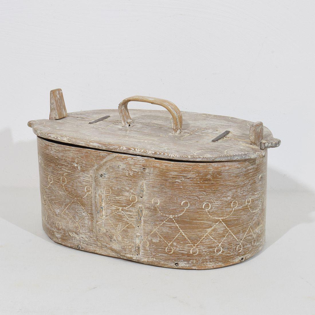 Beautiful Swedish bentwood box that once was used for storage. Real rare piece, with beautiful forged iron repairs on the top.
Sweden, circa 1750. Weathered and small losses and old repairs.
H:23cm  W:41,5cm D:24cm 
