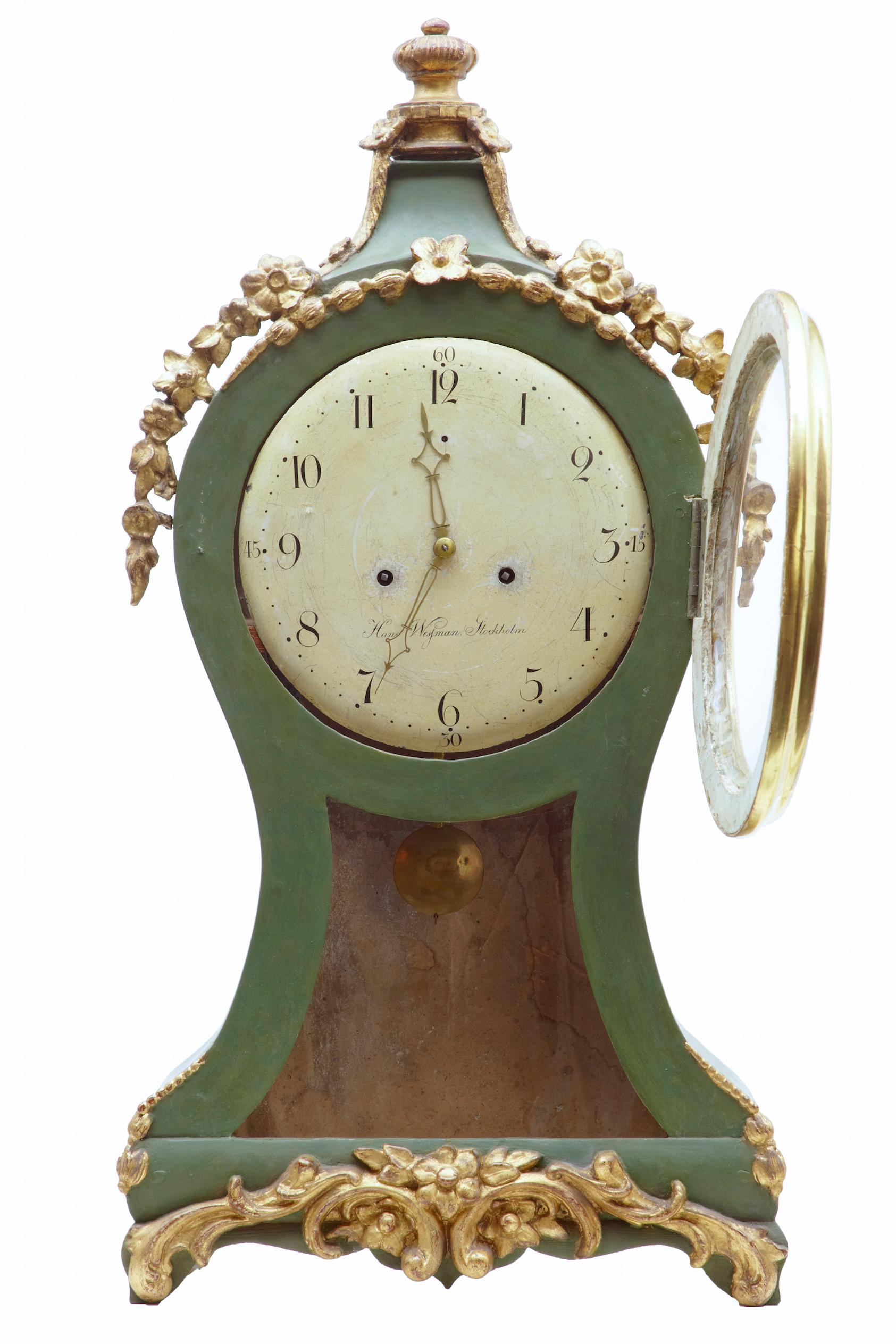 18th century Swedish gilt and painted mantle clock, circa 1790.

Fine quality Swedish clock in original condition. Original green paint with gilt carved wood decoration, a real fine quality piece. Clock face signed hans westman,