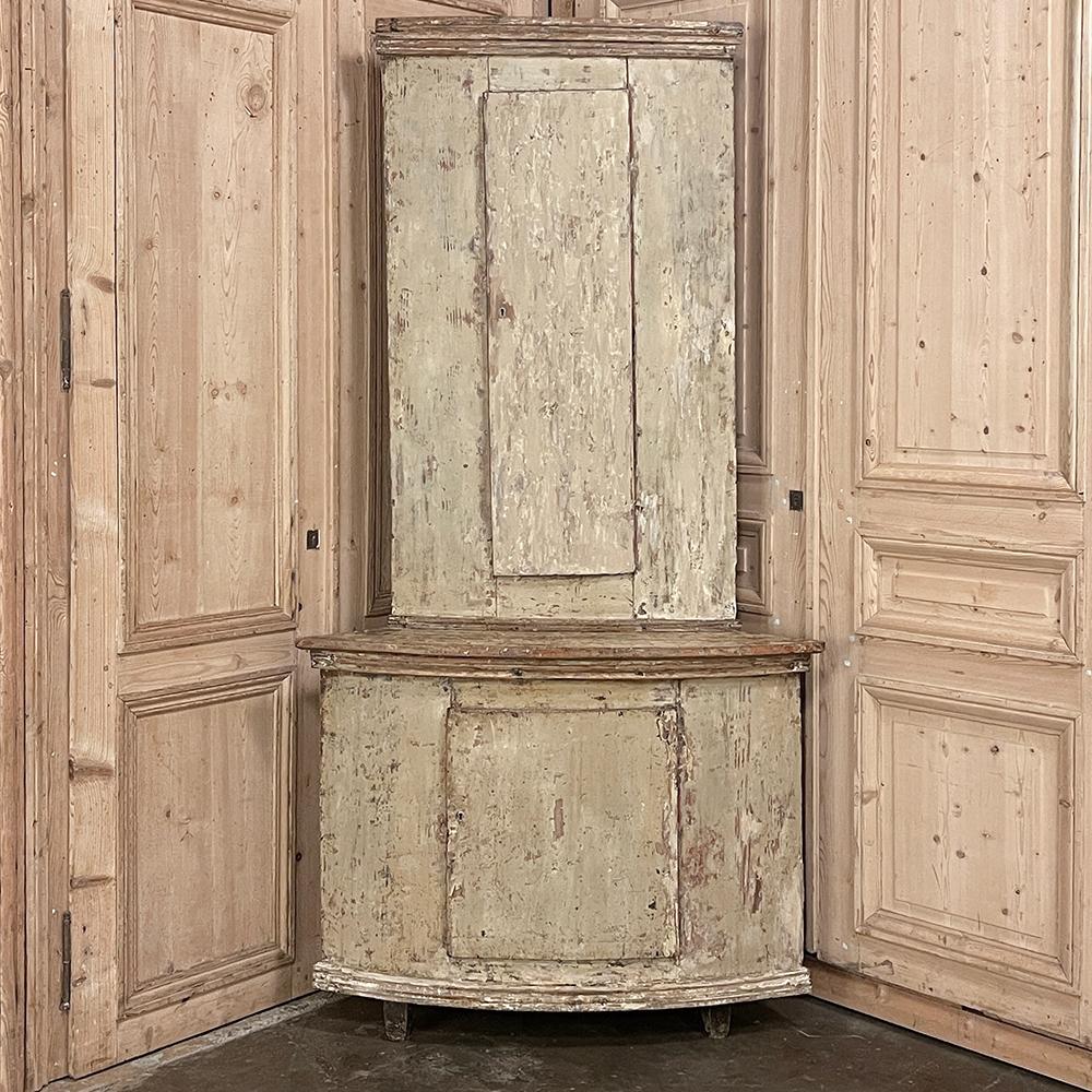 18th century Swedish Gustavian Period Painted Corner Cabinet is a wonderful way to utilize a corner space, normally 
