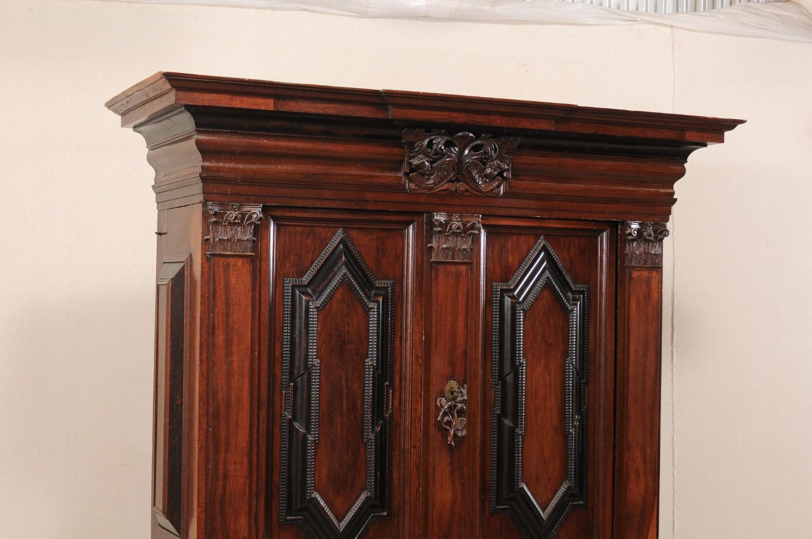 Carved An Early 18th Century Swedish Period Baroque Kas Cabinet with Ebonized Accents For Sale