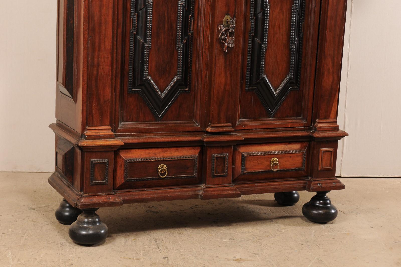 An Early 18th Century Swedish Period Baroque Kas Cabinet with Ebonized Accents In Good Condition For Sale In Atlanta, GA