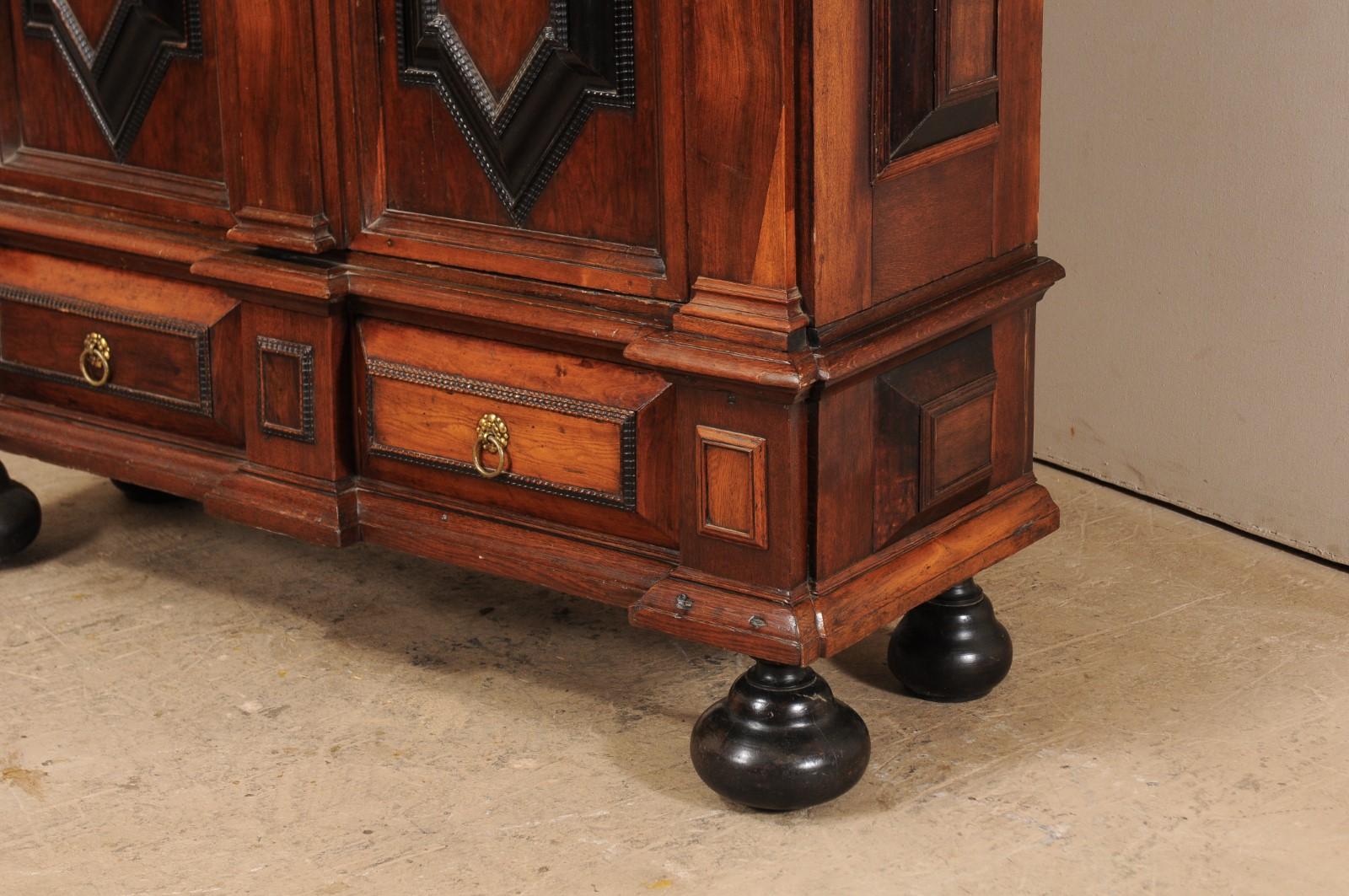 Metal An Early 18th Century Swedish Period Baroque Kas Cabinet with Ebonized Accents For Sale