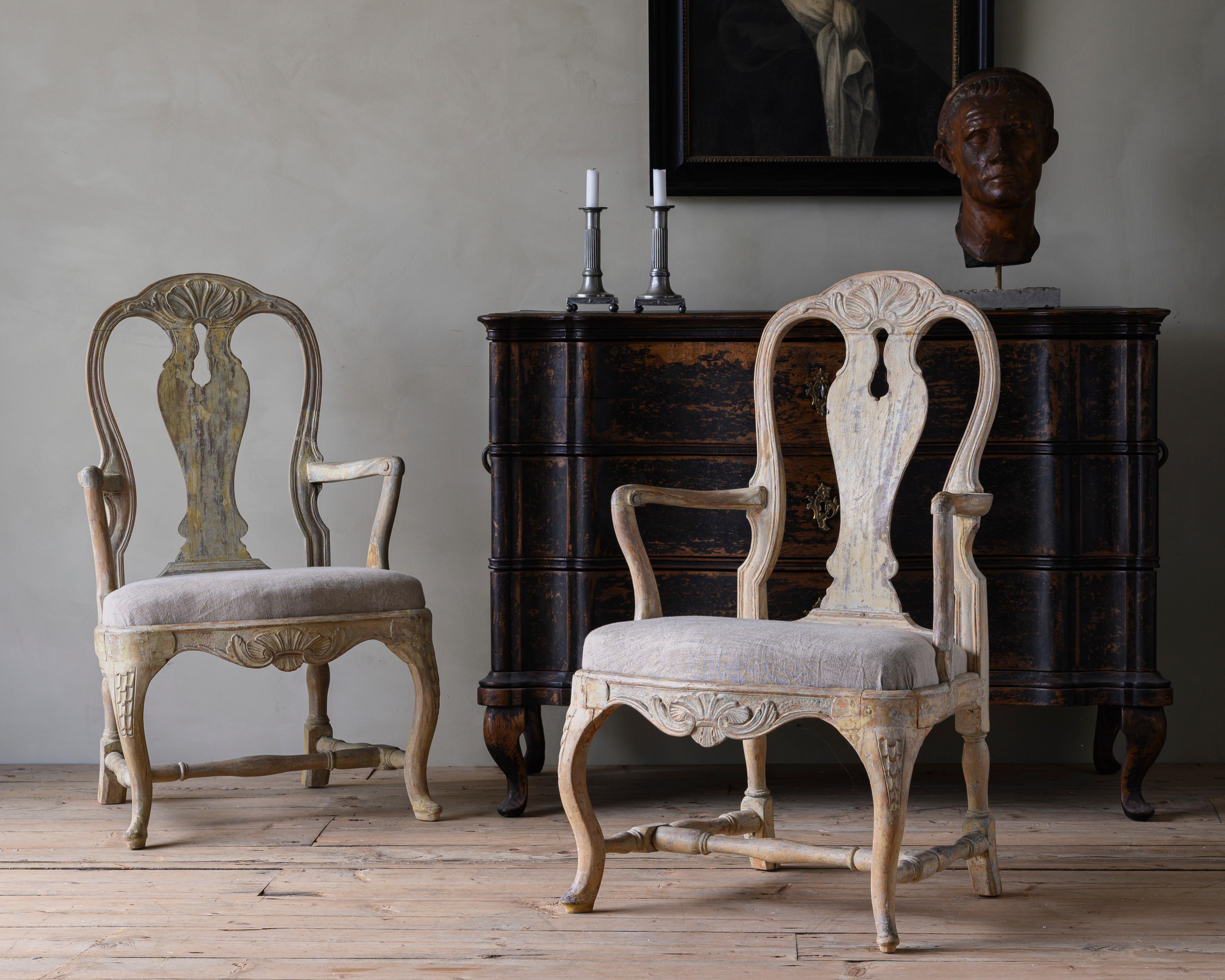 Fine pair of Swedish 18th century Rococo armchairs their original colour grey and upholstered in washed linen. Ca 1760, Stockholm Sweden.