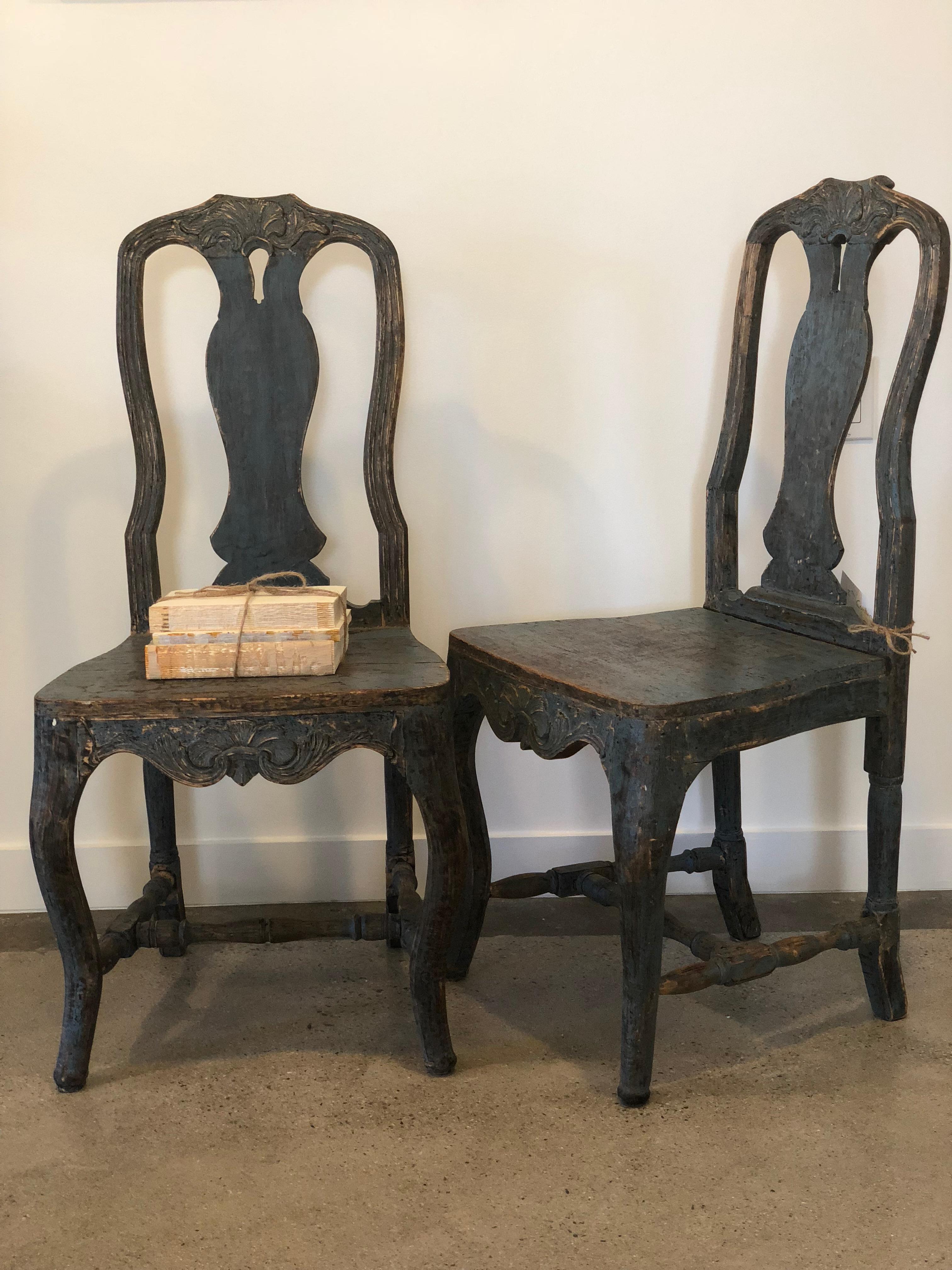 A Swedish Rococo period chair the 18th century in the original beautiful saturated blue color. This pair structurally sound given its age. The blue color has a lovely patina with hints of natural wood, T a special chair.