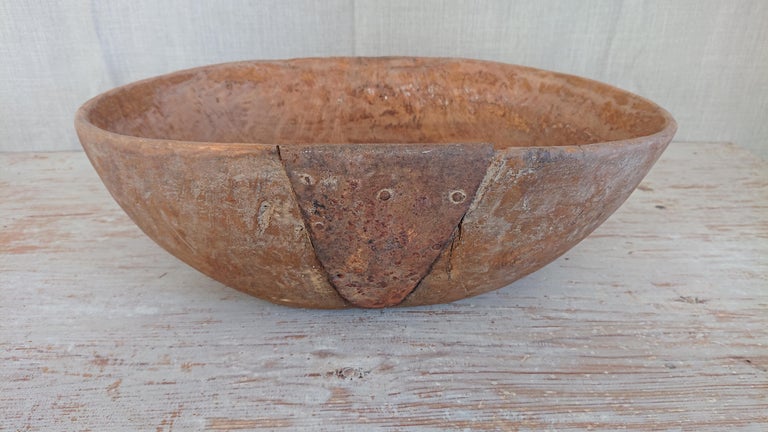 A genuine 18th Century Swedish Folk Art Wooden bowl with lovely patina & original color from Burtrask Vasterbotten, Northern Sweden .

An antique and unique organic wooden bowl.
With highly appealing patina, and the patchwork makes this a unique
