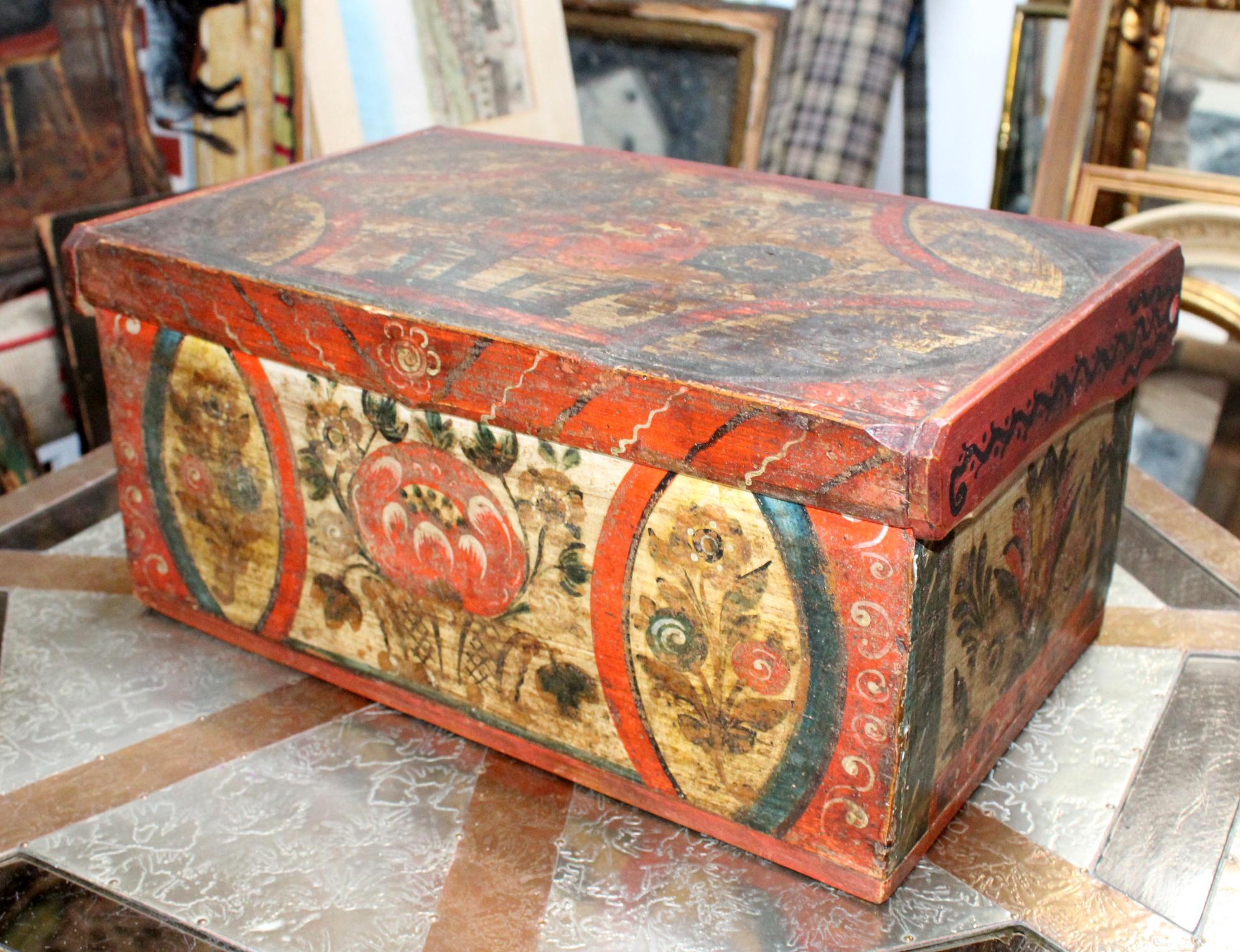 Late 18th century northern Switzerland wooden box with hand painted vegetable motifs.

 