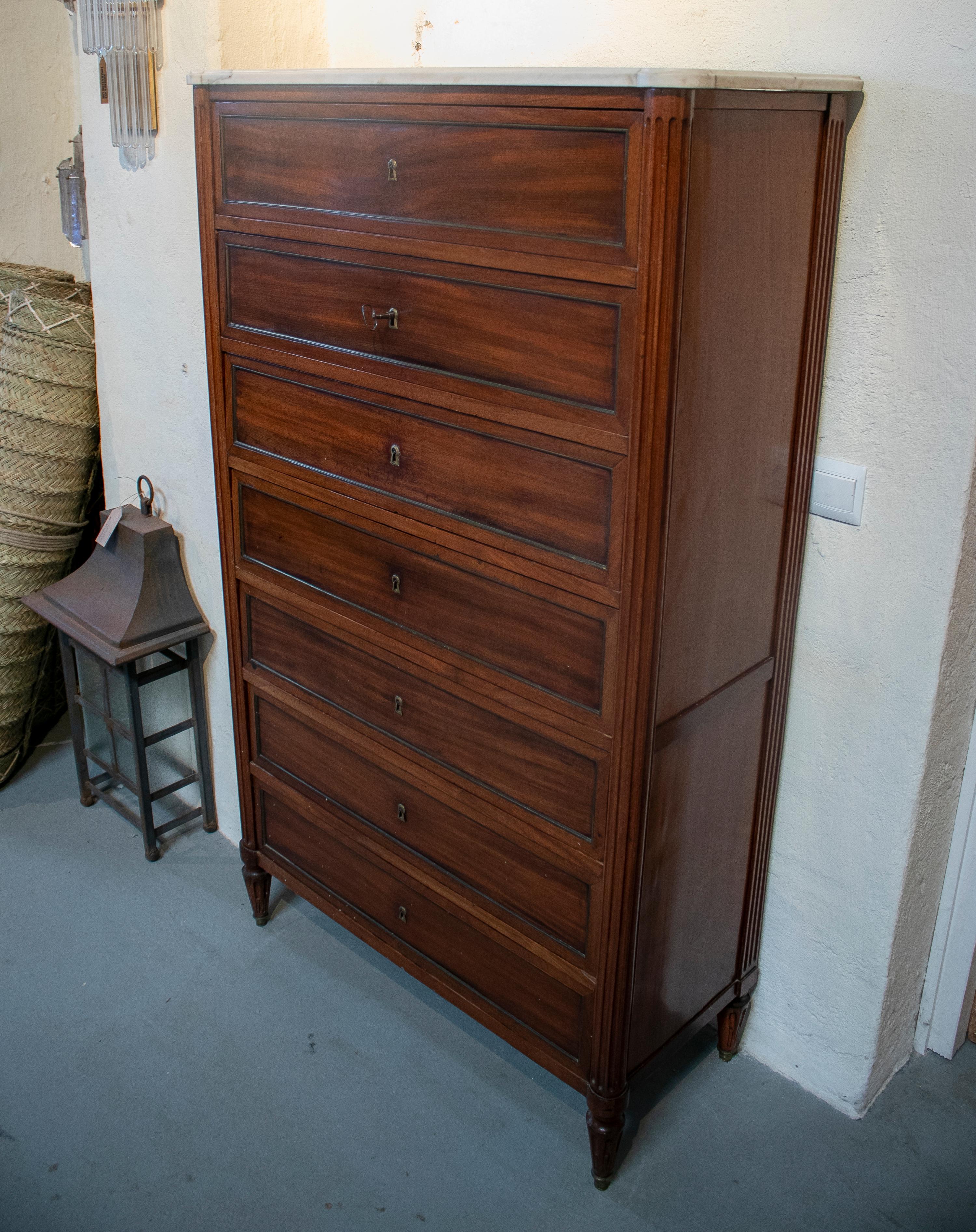 18th century tall French seven drawer chest by important Paris cabinetmaker Conrad Mauter (Maître 1777).
 