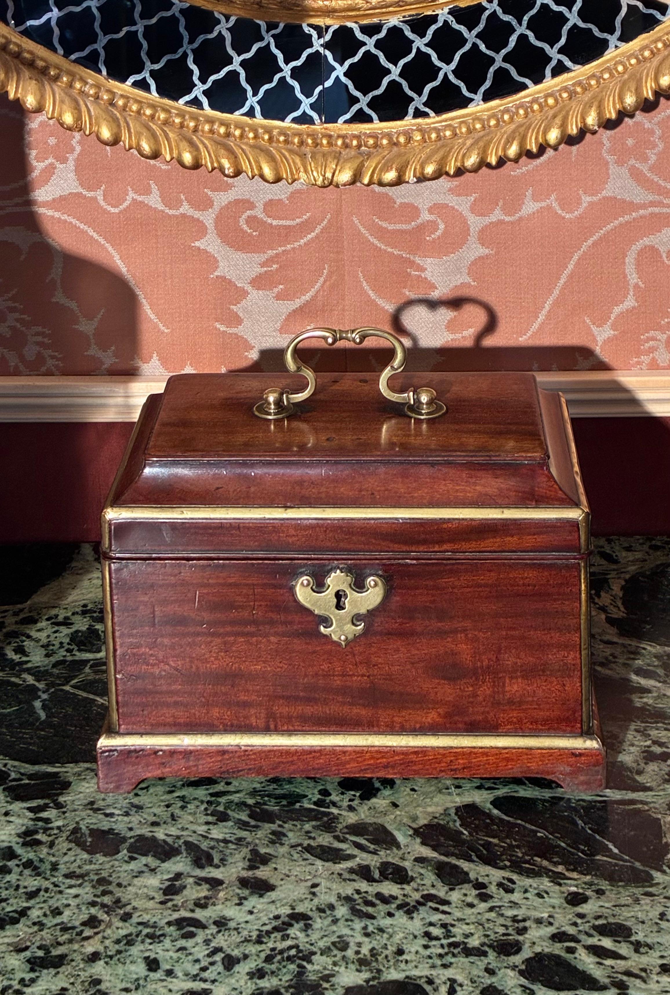 A superb and very rare mid-18th century George II period brass-inlaid tea caddy, attributed to Landall & Gordon. English, circa 1750.

Why we like it

Gorgeous proportions combined with figured mahogany and smart brass inlays. 

Attribution

The