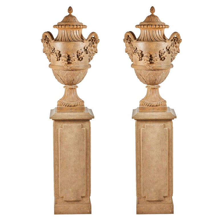 Terracotta urns on pedestals from the collection of Karl Lagerfeld, 18th century, offered by Timothy Corrigan Antiques