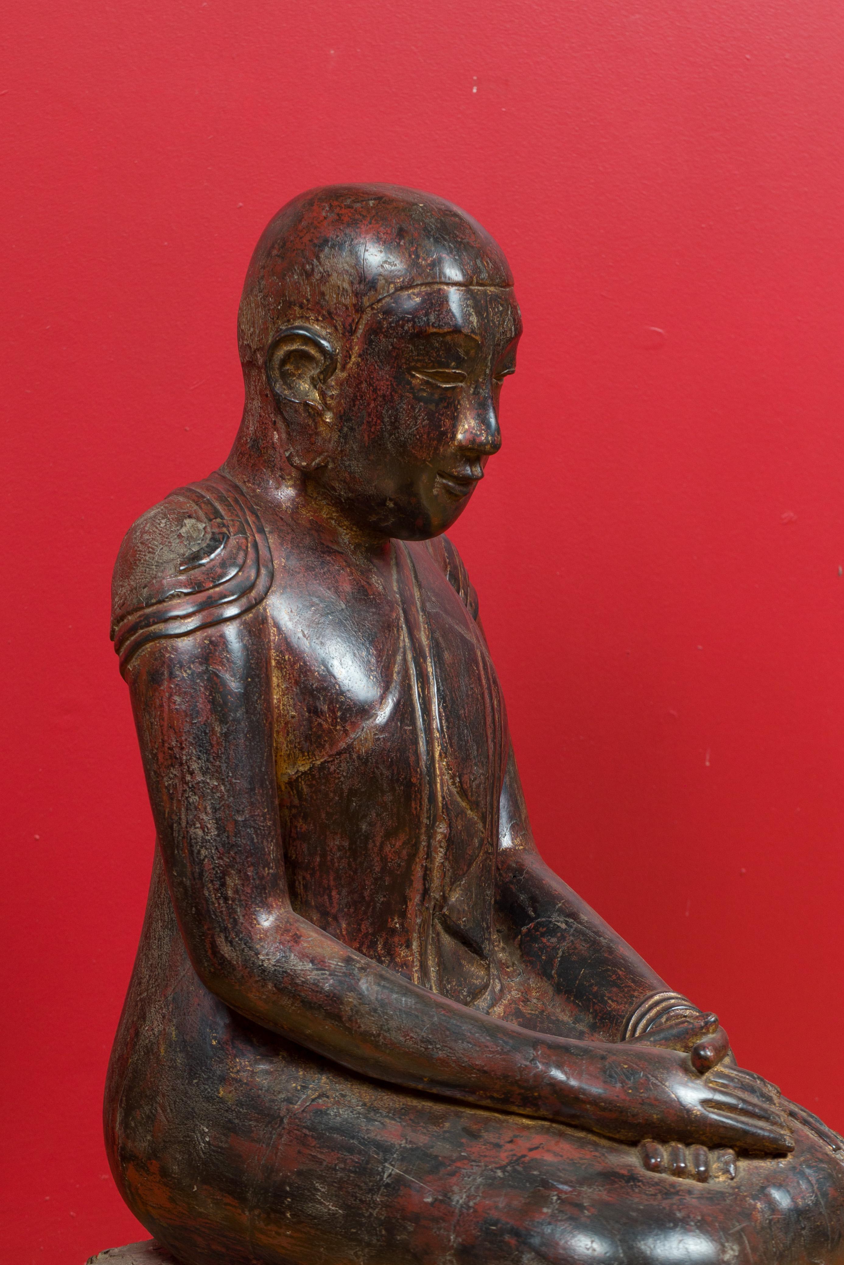 18th Century and Earlier 18th Century Thai Hand Carved Lacquered Wood Sculpture of a Seated Monk For Sale