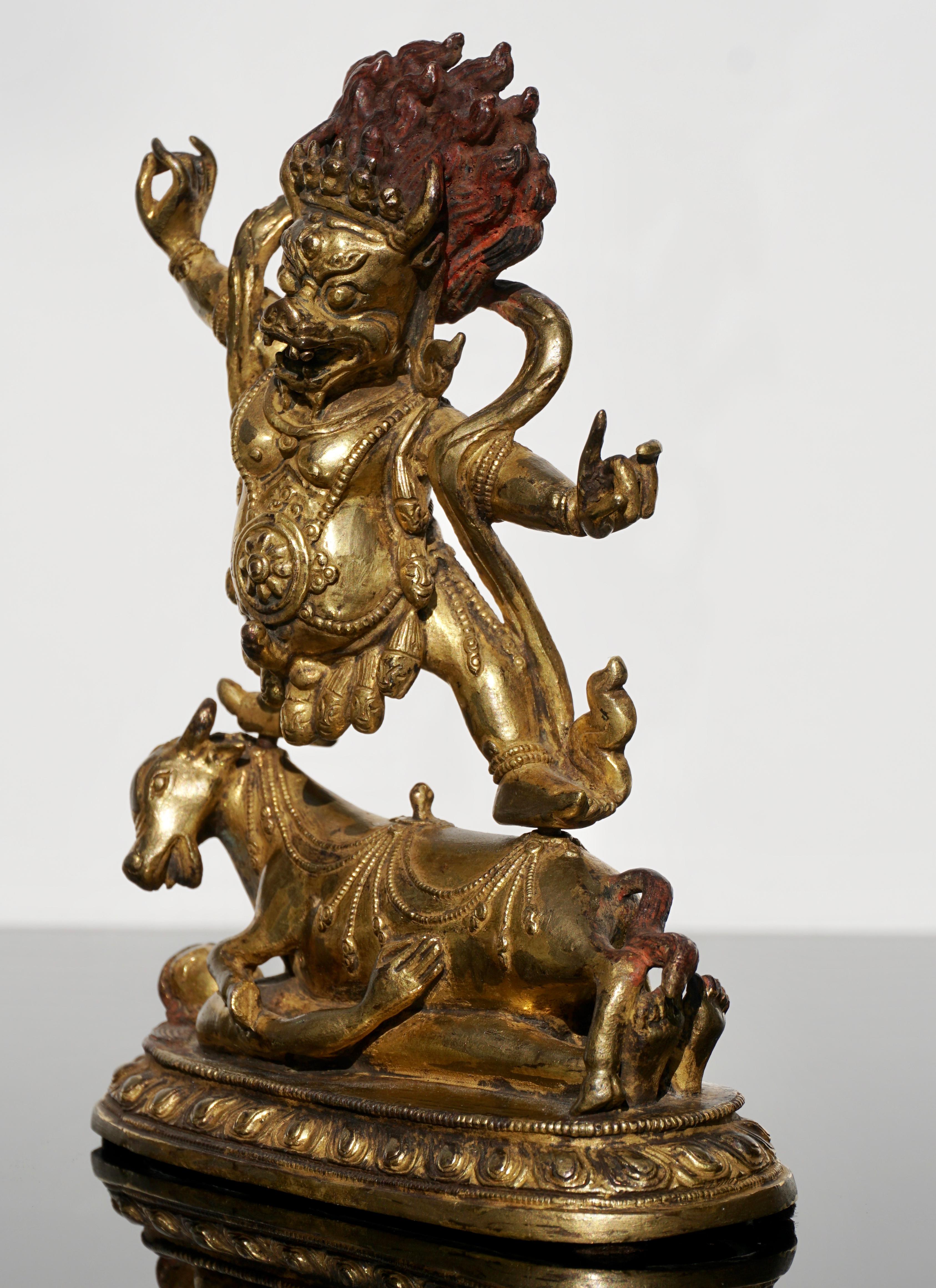 A gilt bronze Buddha figure of a Wrathful Deity
18th century (Darmaraja) Dharmaraja, the original Sanskrit term for Chogyal, which may refer to a secular ruler of Sikkim or Bhutan, or a higher-ranking monk in Tibetan Buddhism

The wrathful deity