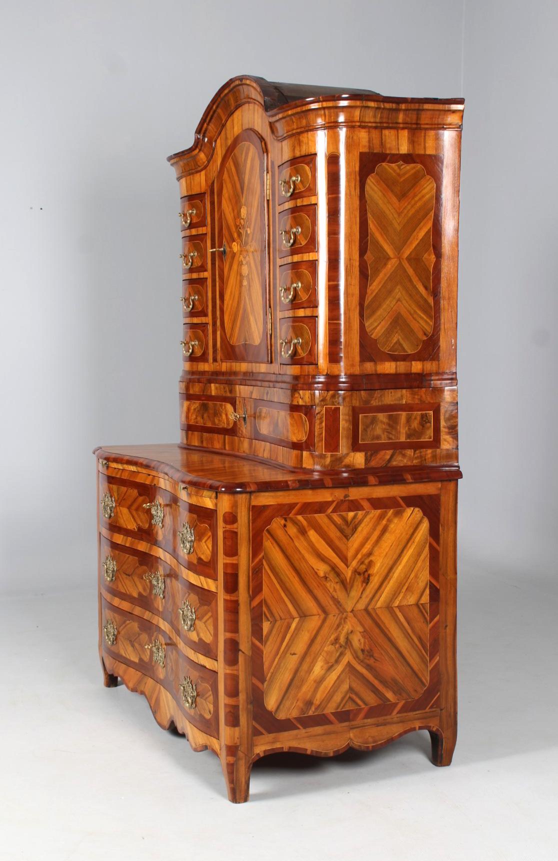 Antique sideboard, buffet, chest of drawers with attachment

South Germany
walnut, plum etc.
Classicism around 1770

Dimensions: H x W x D: 192 x 125 x 71 cm

Description:
Three-piece piece of furniture from the Transition period, i.e. the