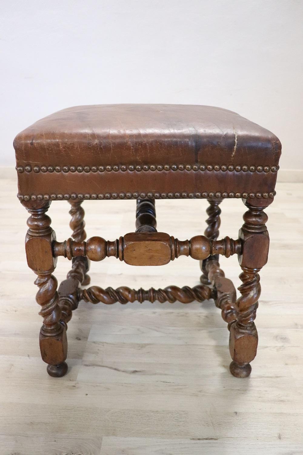 Beautiful and rare 18th century antique stool. Made of walnut wood with brown leather seat. Lovely turned walnut legs. Good condition to report some signs of wear in the leather.