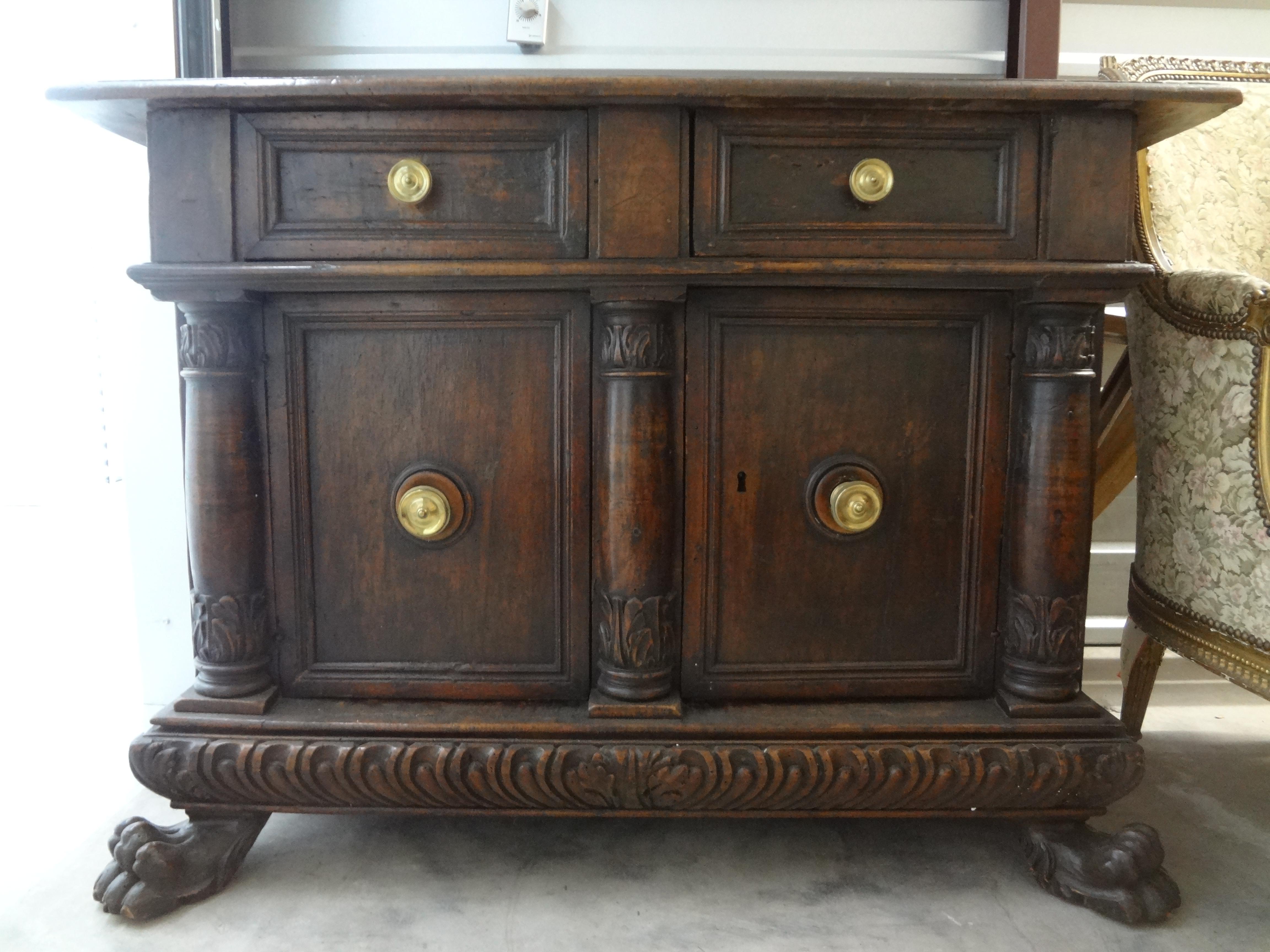 18th Century Tuscan Cabinet.
This handsome antique Tuscan cabinet or buffet has two drawers above two cabinet doors below with great original brass hardware and paw feet.
Our versatile Italian cabinet can be used in many rooms including a dining