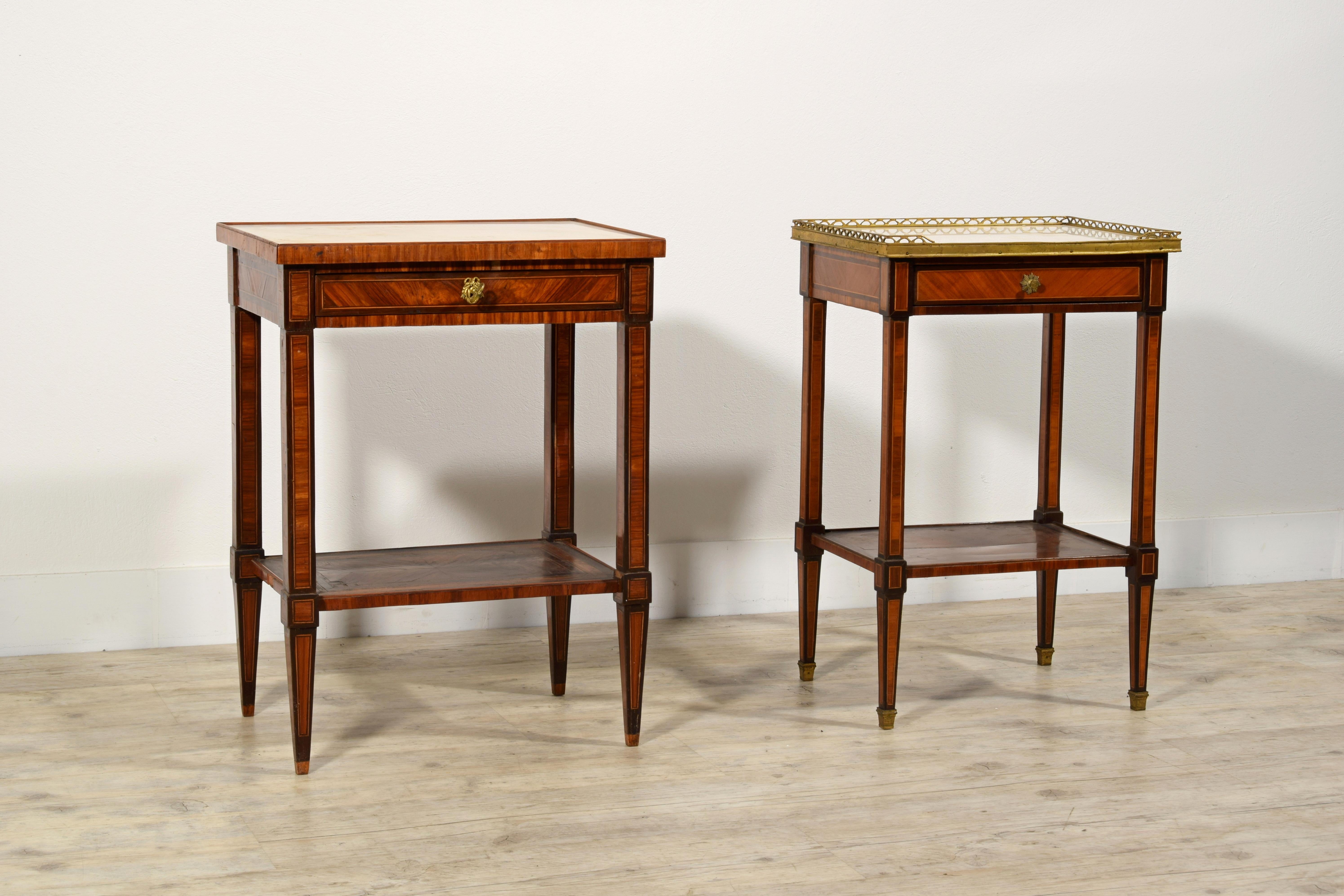 Two Louis XVI center tables in veneered wood, marble top and gilded bronze finishes, France, second half of the 18th century

Measurements: left side table: cm L 49 x P 35 x H 65; right side table: cm L 42 x P 34 x H 66

These two coffee tables