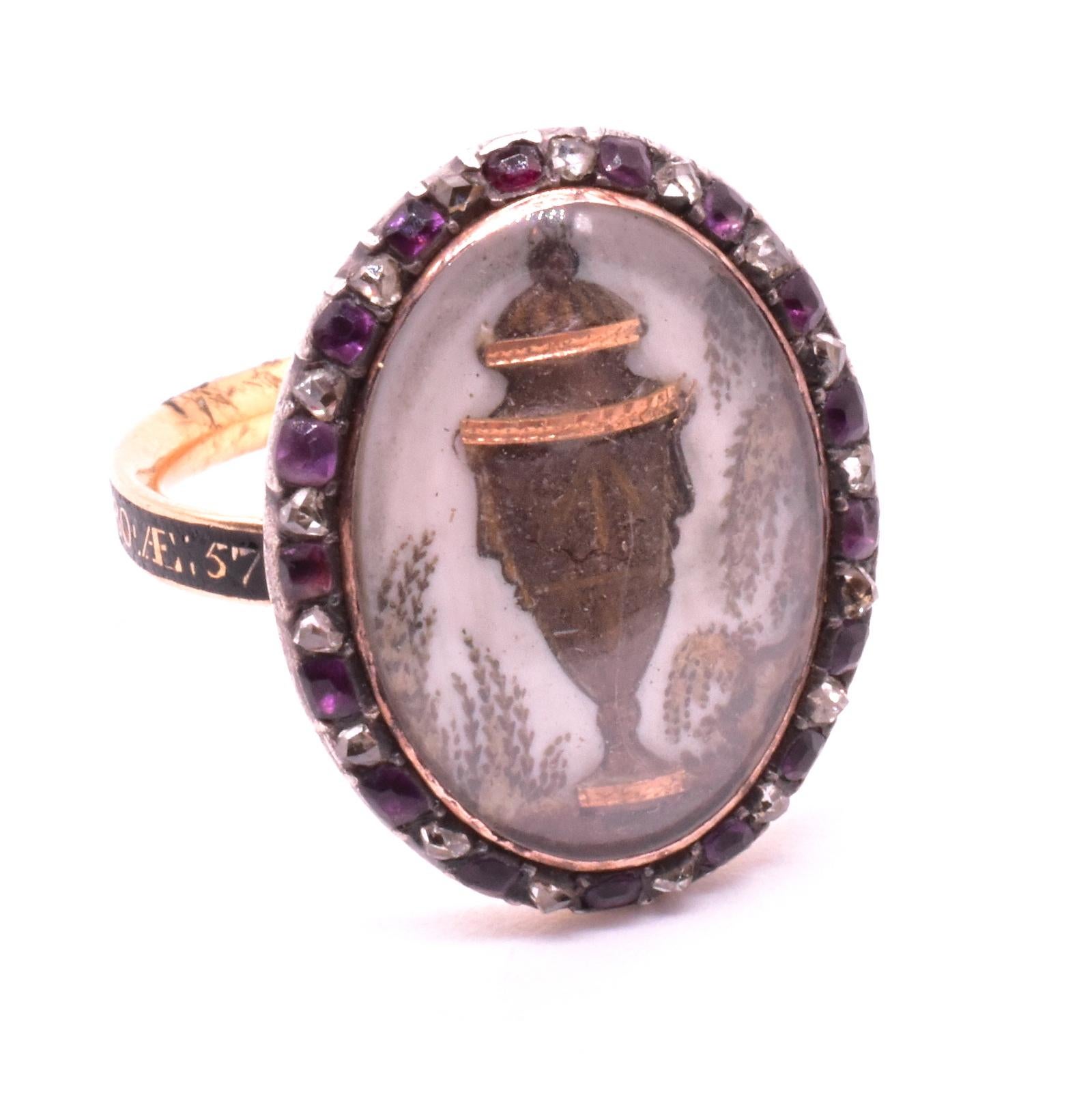 Exquisitely crafted hair paint memorial ring of an urn embellished with gold and surrounded by weeping willow branches. The enamel band says 