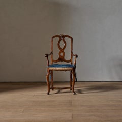 Sillón veneciano del siglo XVIII, de nogal tallado a mano, con asiento de paja