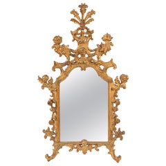 Espejo veneciano de madera dorada tallada del siglo XVIII