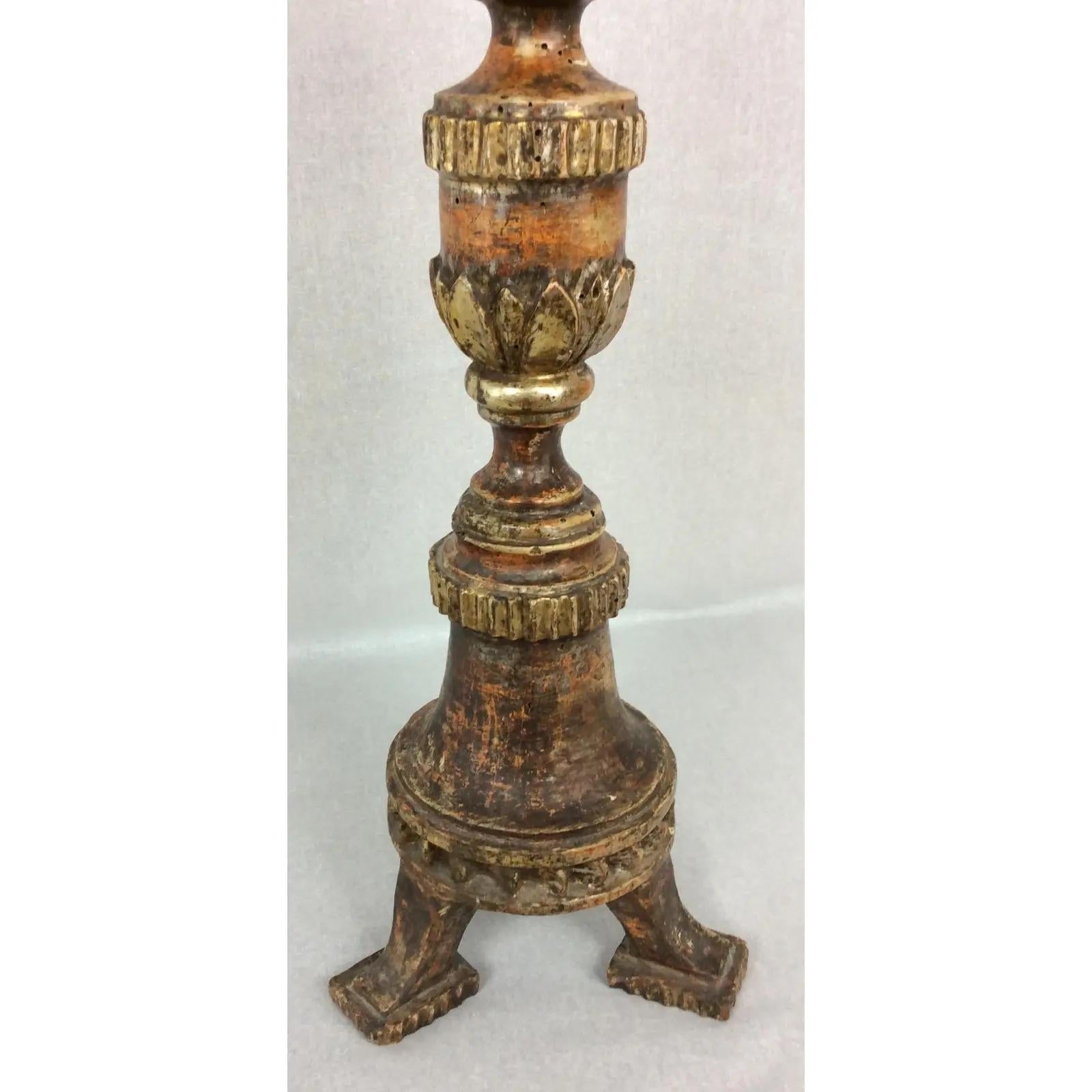 Fine 18th Century Venetian candle stand or spike, hand-carved and gilded wood. Beautiful columnar shape on a square platform base on bun feet.

This gorgeous item is very decorative and will enhance any space whether used as a light fixture or its