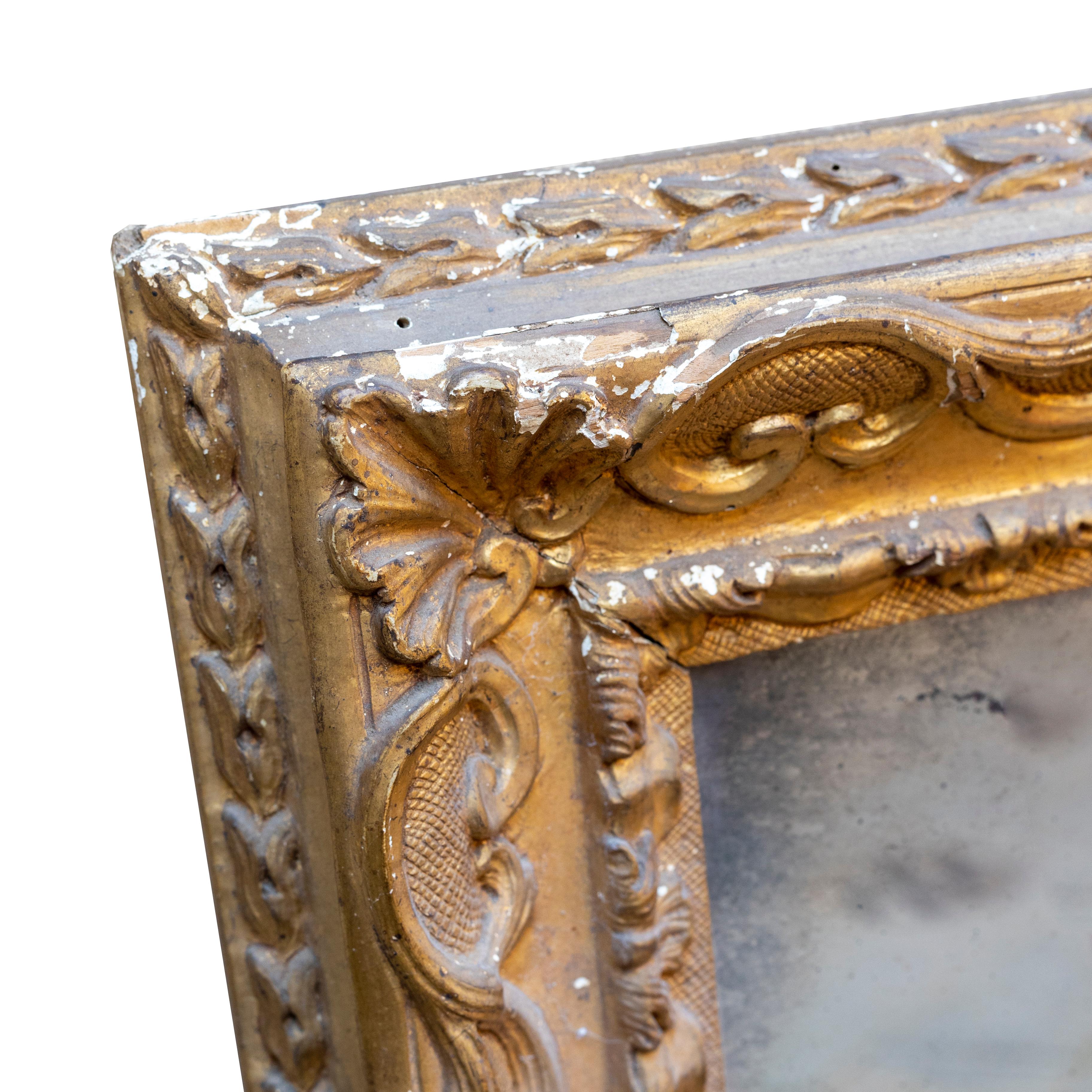 Italian 18th Century Venetian Hand Carved Gilt Wood Fram with Antique Mercury Mirror