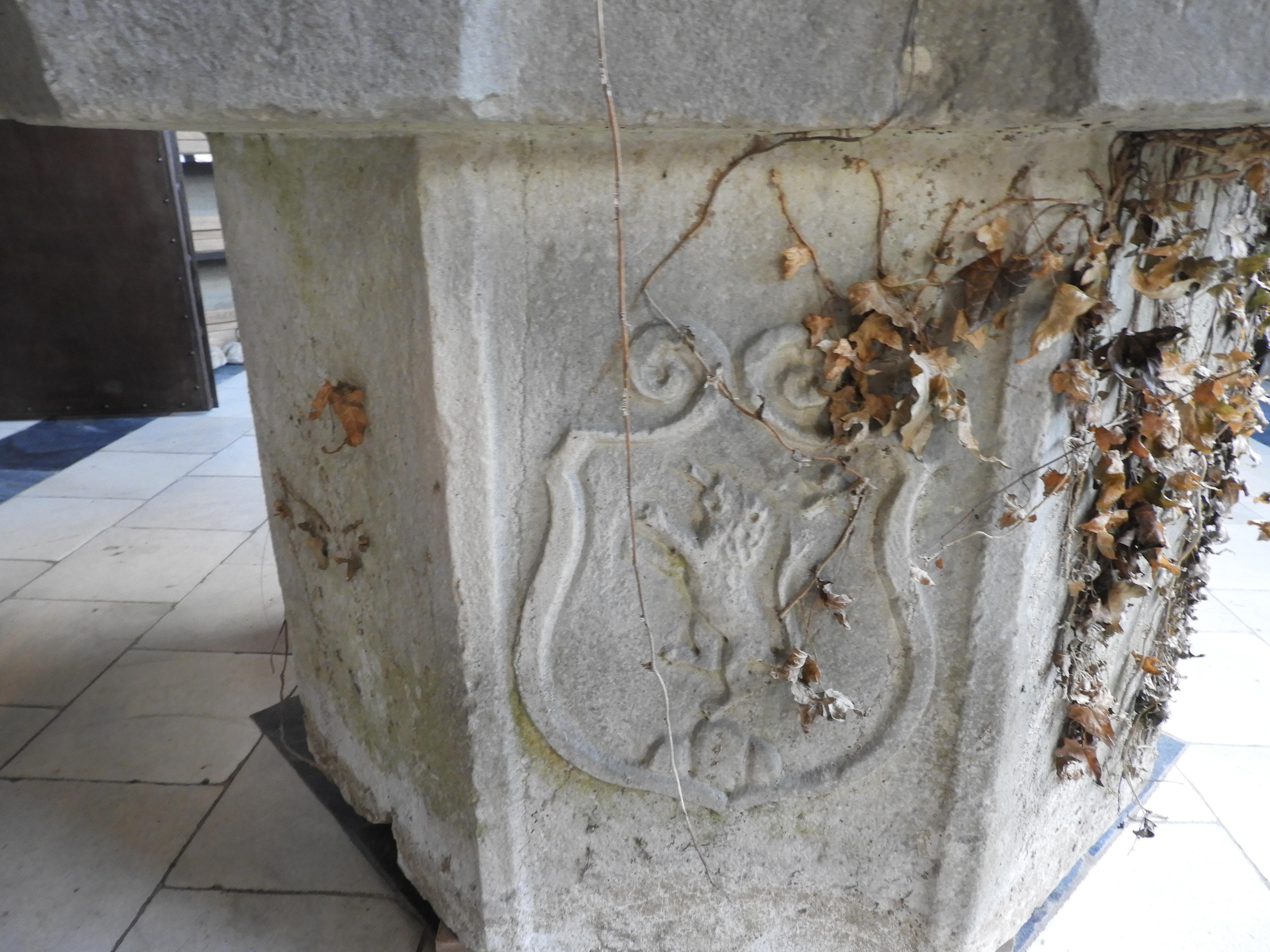 18th century venetian wellhead with decoration on all 4 sides.