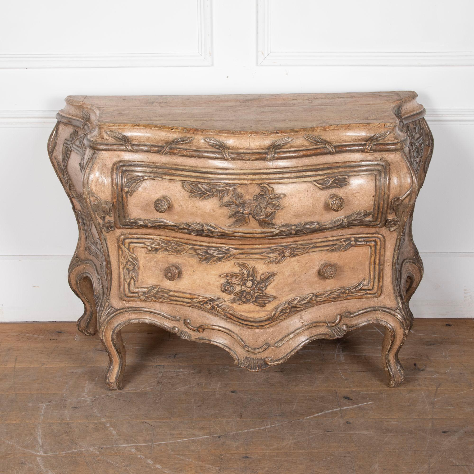 Beautiful 18th Century hand carved Venetian bombe shape two drawer commode.
With original hand painted soft pink finish and silver gilt details.
Circa 1750.