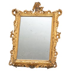 18th-century Venetian Mirror in Carved and Gilded Wood with a Crest at the Top