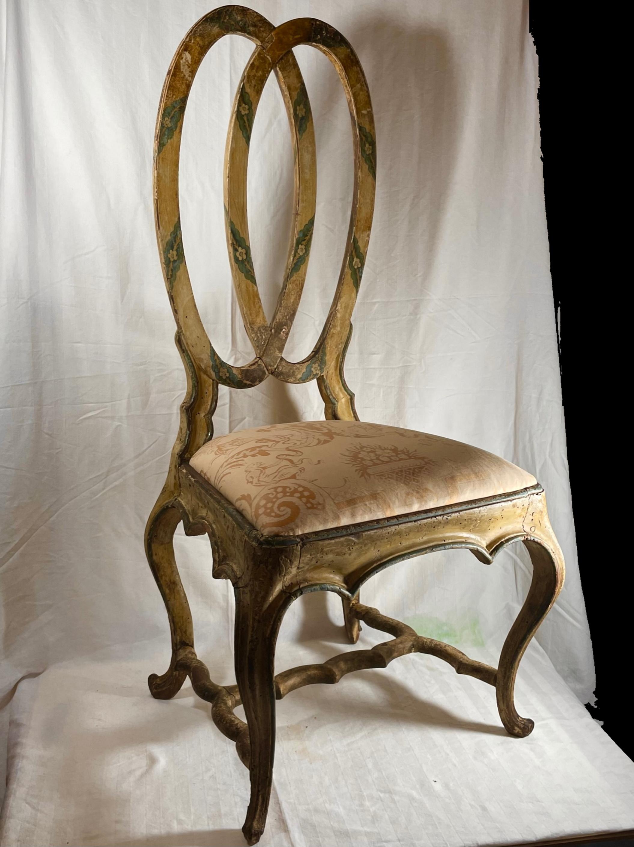 18th Century Venetian Polychrome Painted Rococo Side Chair

Charming polychrome hand painted and masterfully hand carved Venetian side chair. Cabriole legs are joined by stretchers at their base. This chair with its delicate carved rounded curving