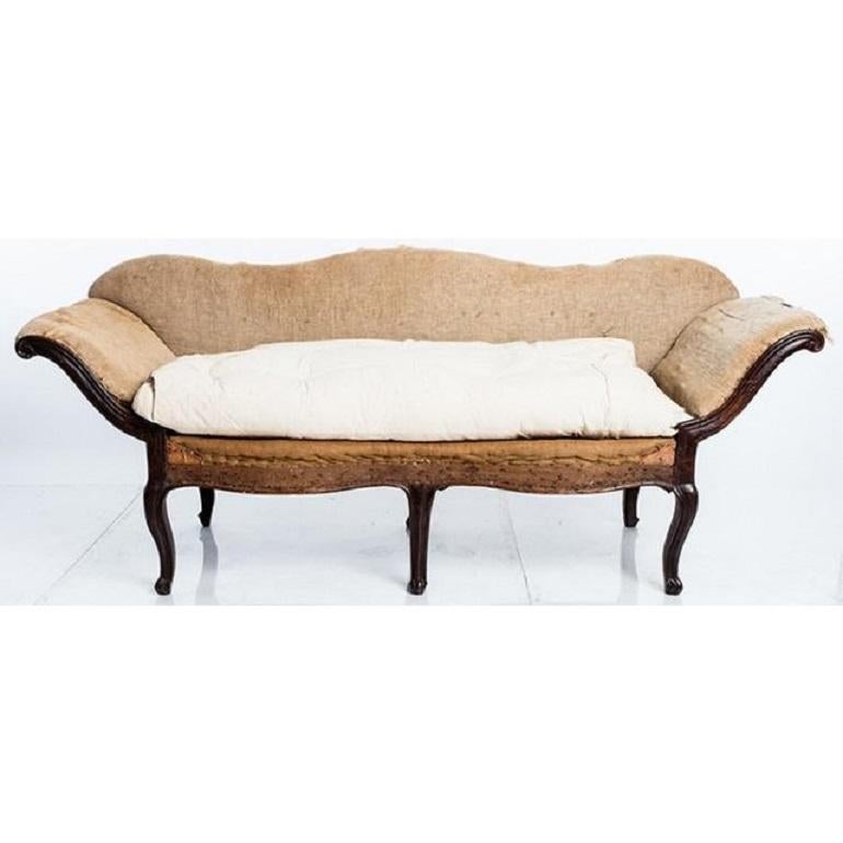 Lovely Venetian sofa with scrolled arms, made in Italy circa 18th century. This luxurious, curvy sofa has wonderful bones, offered as an excellent candidate for upholstery restoration. The couch has traditional horsehair and coconut fiberfill at the