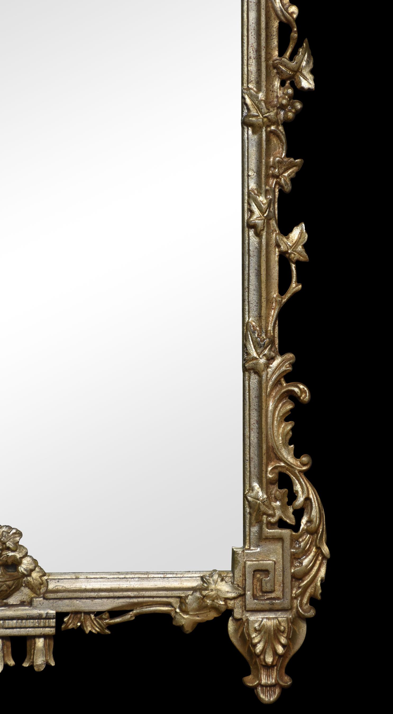 18th-century Venetian-style silvered wall mirror, with fruiting urn crest and Greek key corners to the original mirror plate surrounded by floral detail.
Dimensions
Height 55.5 Inches
Width 32.5 Inches
Depth 3 Inches.
