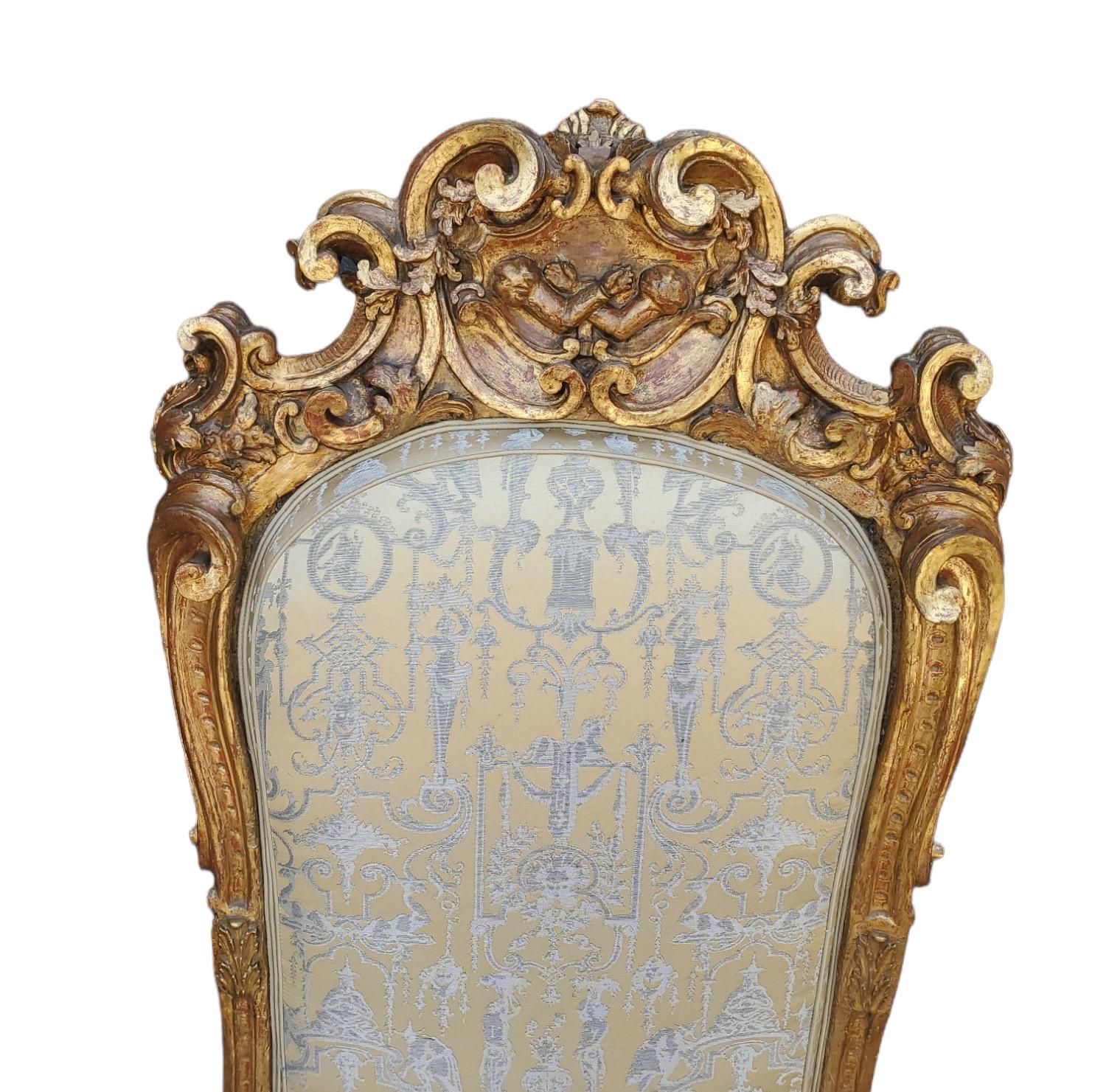 Hand-carved 18th Century giltwood newly-upholstered in Rubelli metal silk fabric.