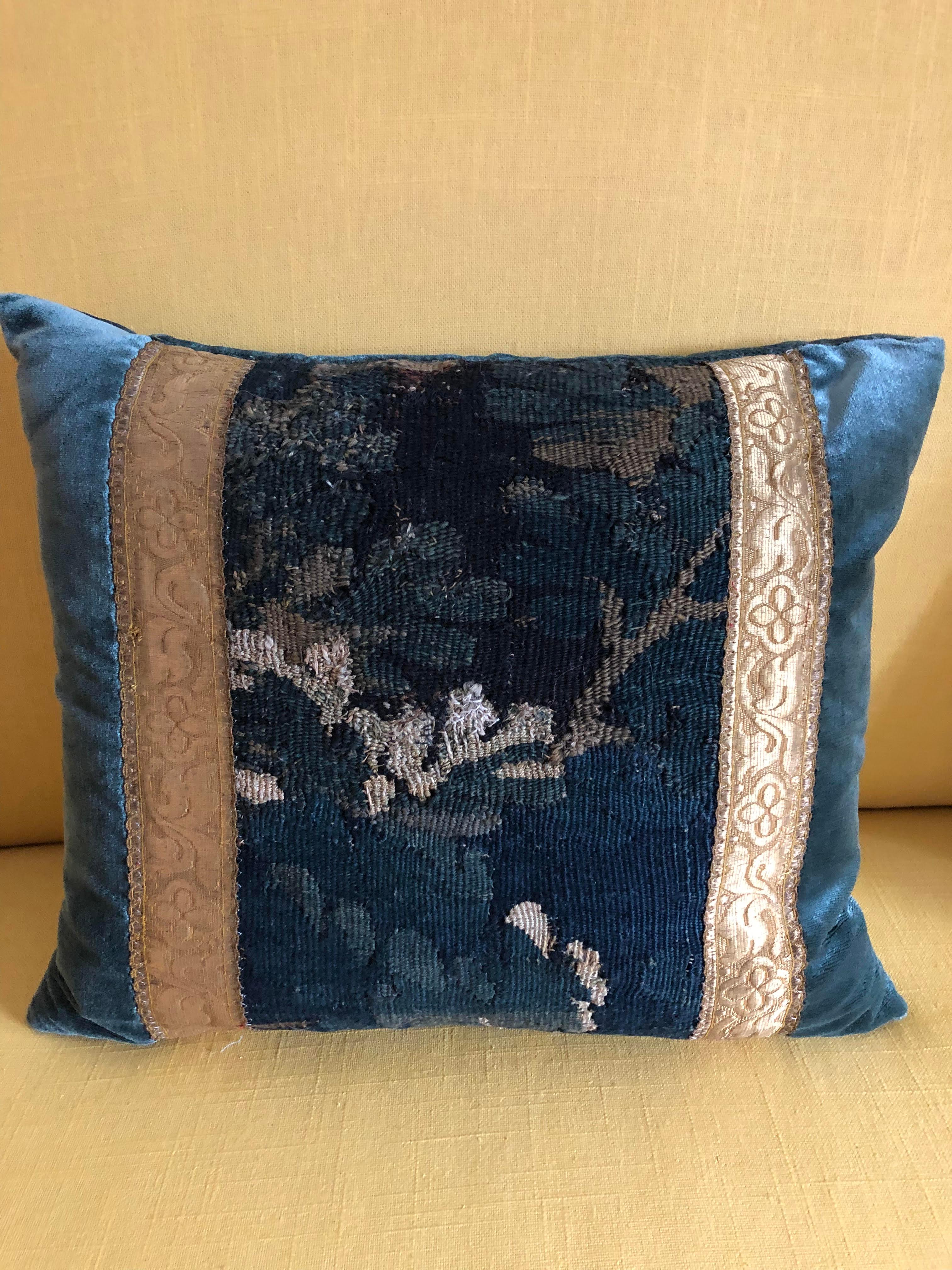 Gorgeous Schumacher silk velvet jewel-toned pillow with verdure tapestry piece framed by French gallon. Down filled.