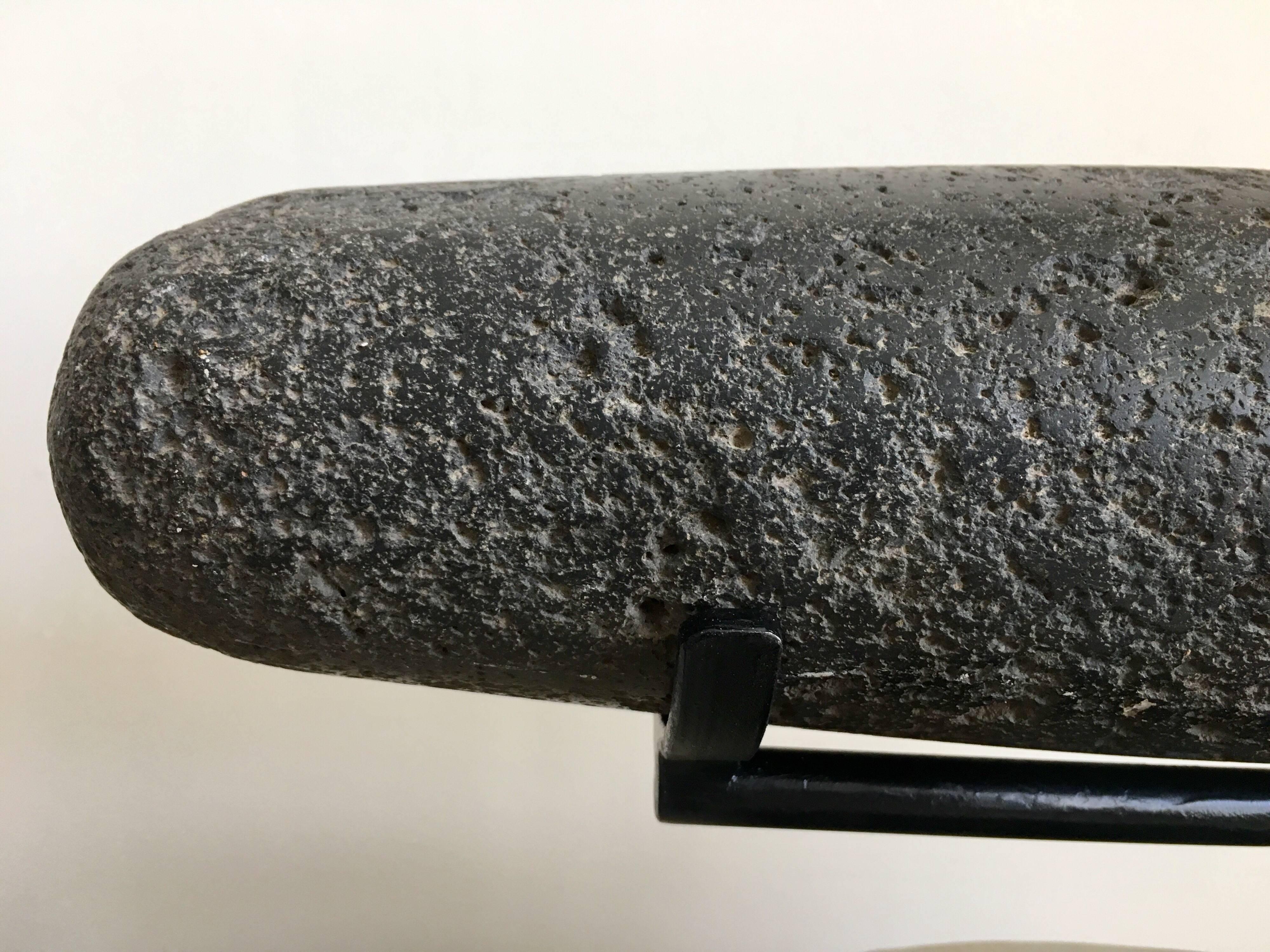 Large grinding pestle composed of dense volcanic stone from the state of Puebla. Popoloca culture. Rod iron base included.
Pestle 16.5