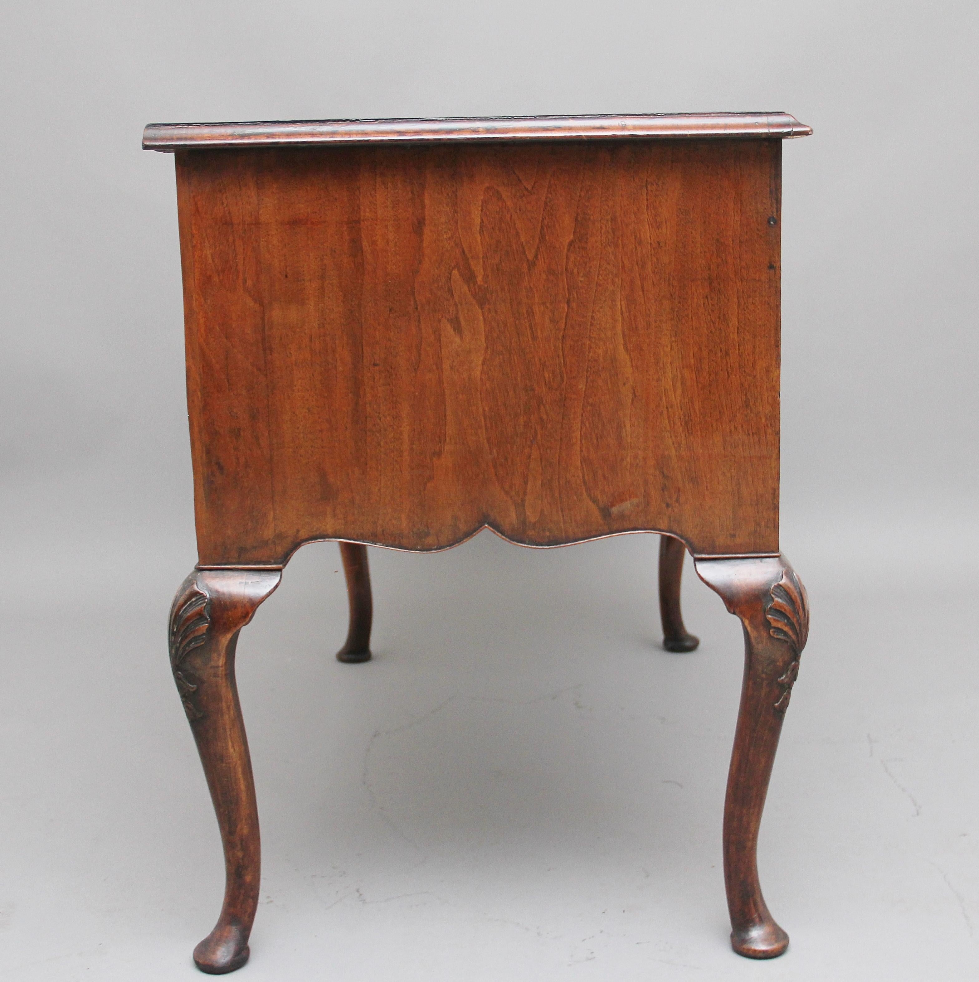 British 18th Century Walnut and Feather Banded Lowboy For Sale