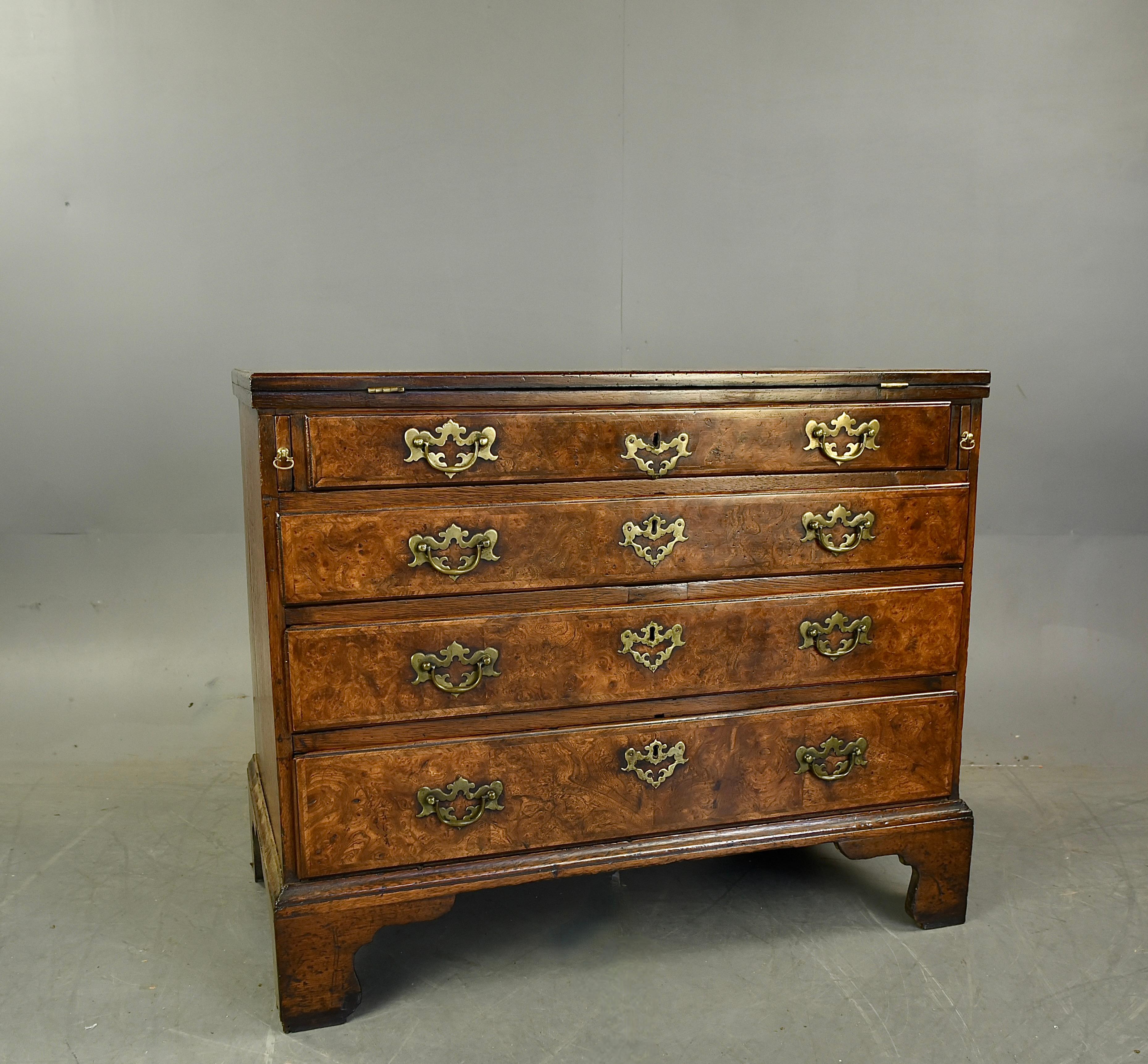 Fine quality mid 18th century burr walnut bachelors chest of drawers .
This fine chest has been fully restored to a high standard with some replacements 
It has an unusual useful 2/3 rd flip top with 1/3 fixed section .
The oak lined drawers all run