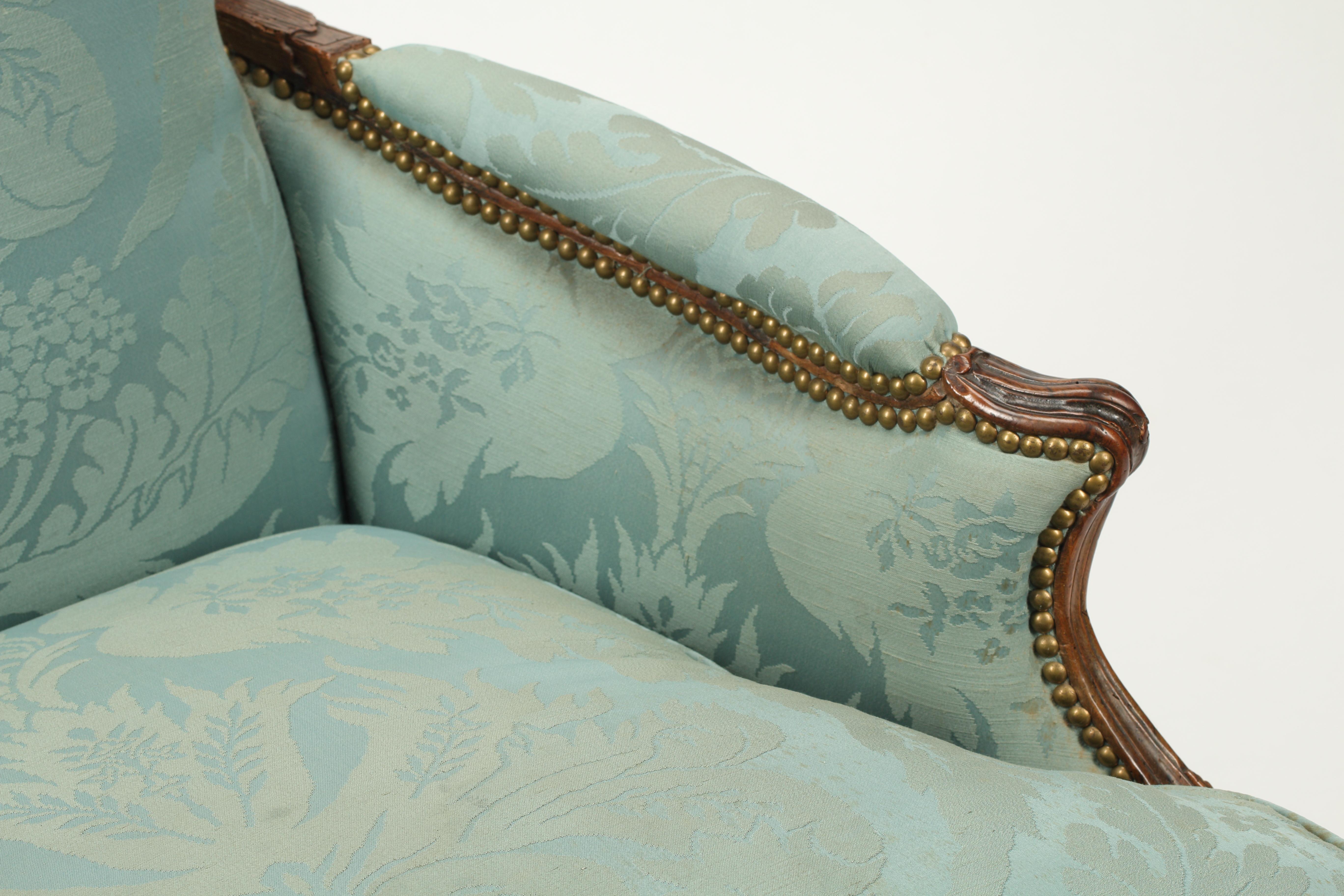 French 18th Century Walnut Bregere, Upholstered For Sale