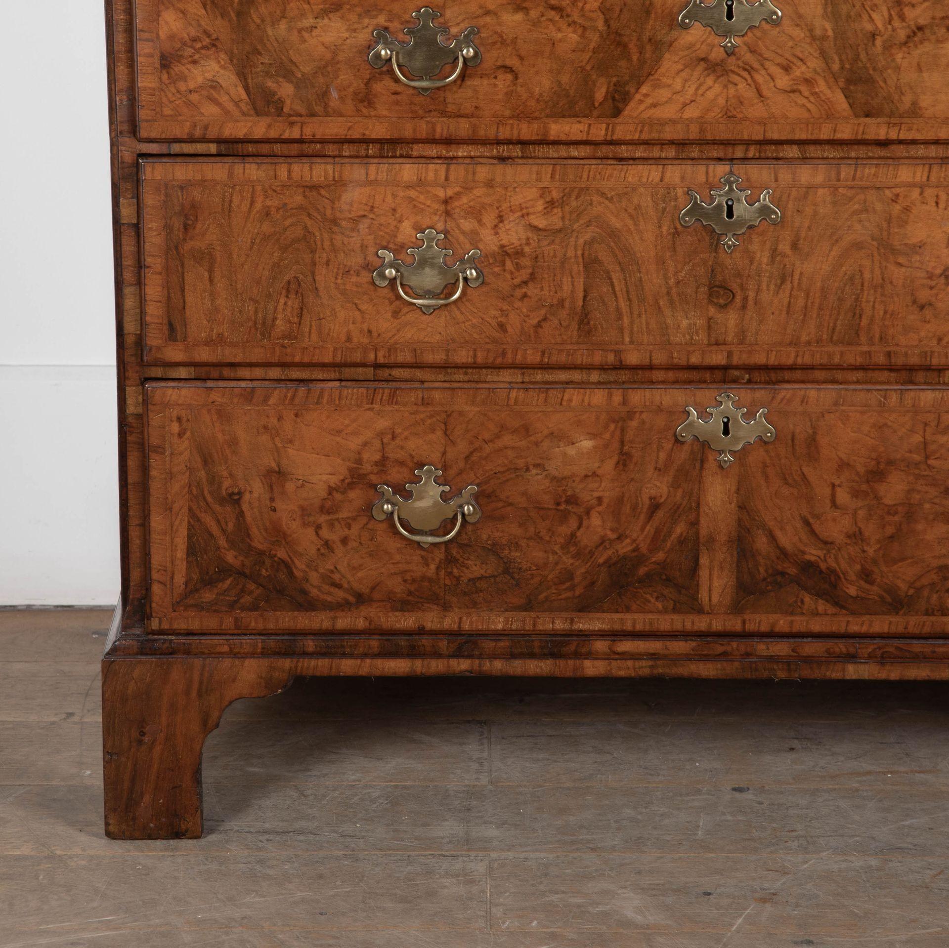 Early 18th century very fine and grand example of a walnut chest on chest/tallboy.
The cavetto cornice above an arrangement of three short and three long drawers to the top half, which are flanked by fluted, canted corners, above the base with a