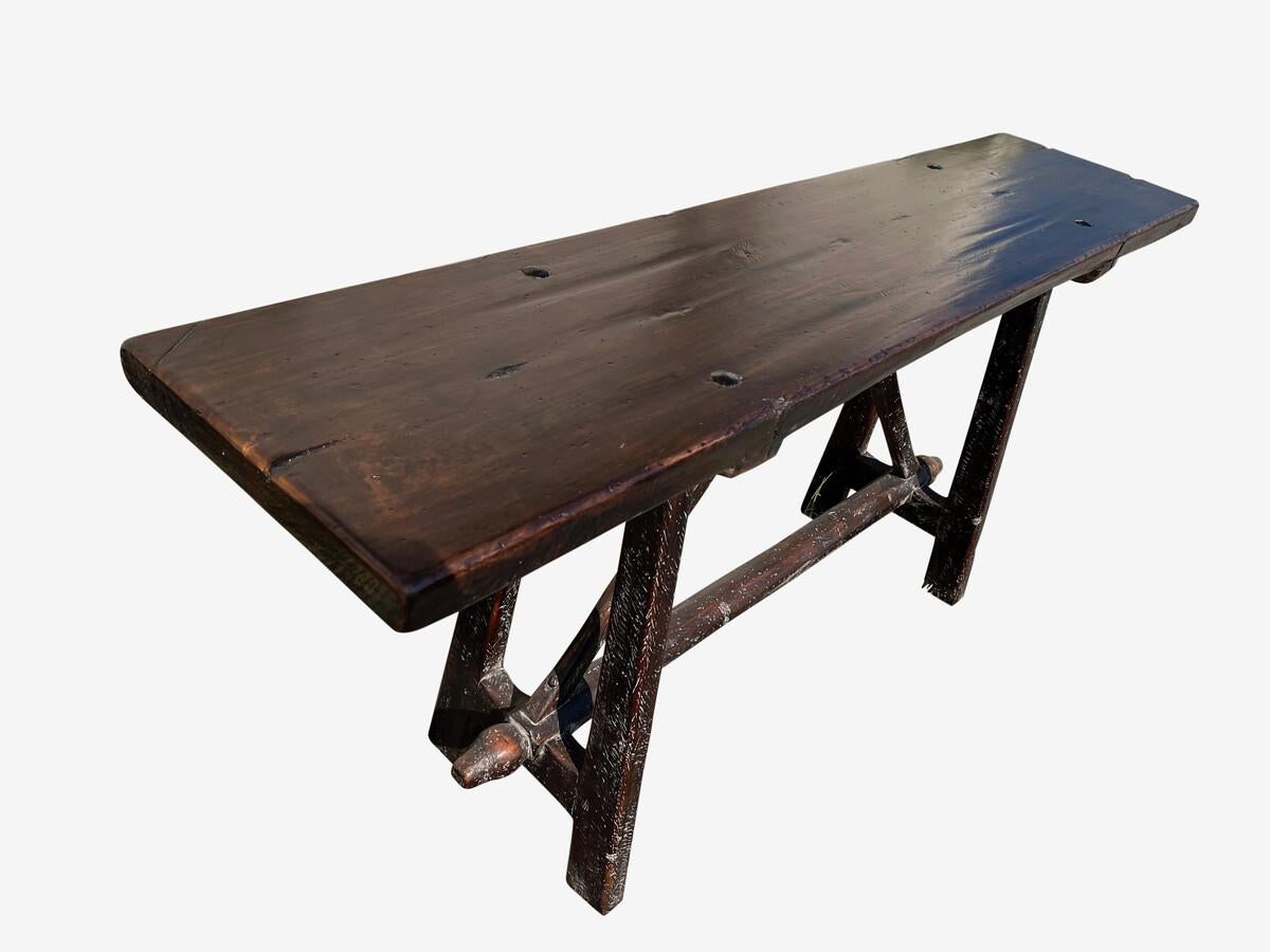 18th century classic Italian walnut console table.
Traditional trestle base.
Newly refinished.