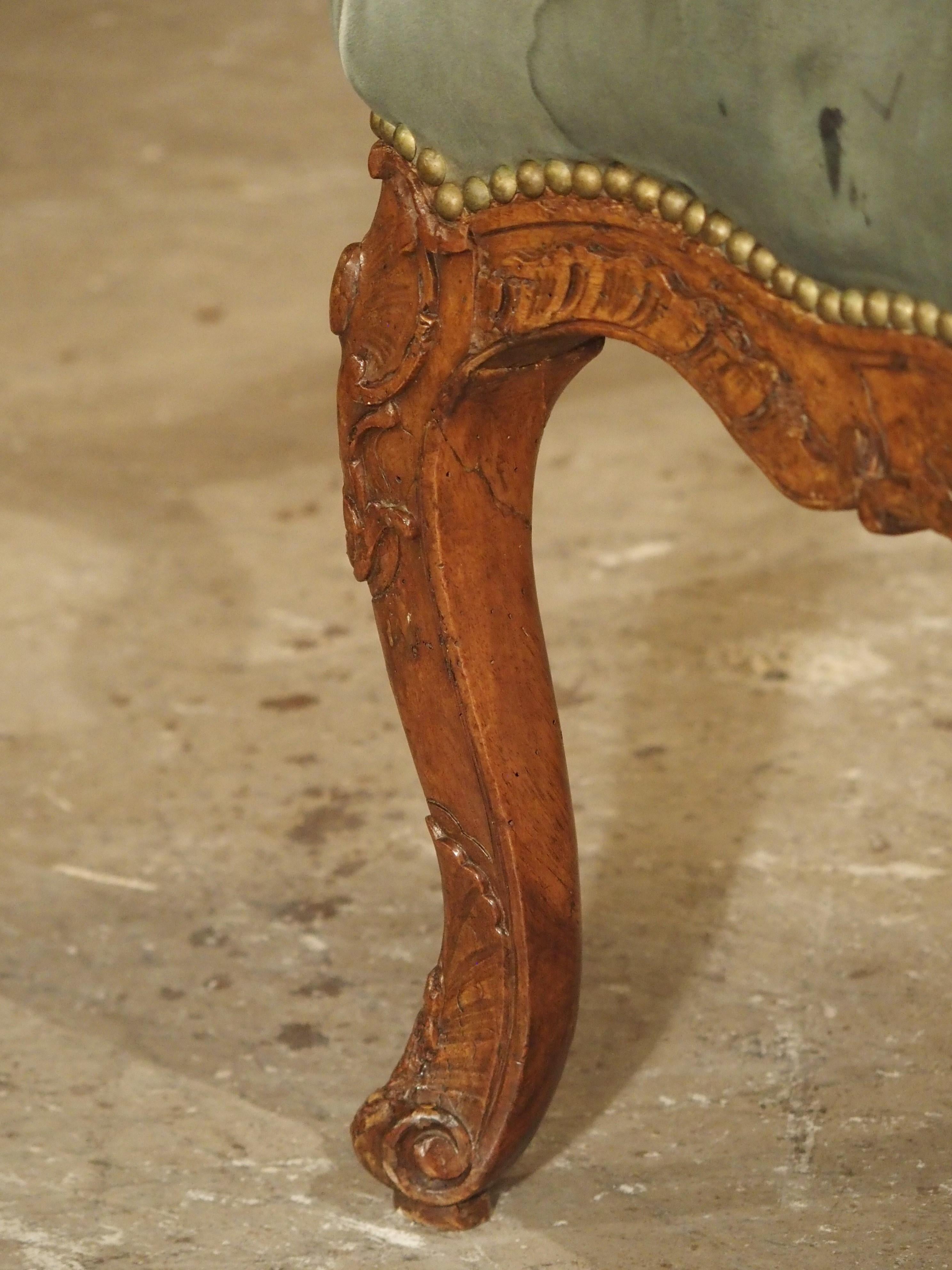 Hand-Carved 18th Century Walnut Wood Fauteuil by Nicolas Foliot, Furniture Maker to the King
