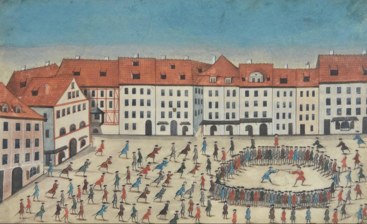 A truly rare and remarkable scene of hundreds of swordsmen meeting in a towns square. The circle is closed around the two in the duel, each of whom have drawn blood. German school 18th century.
Titled Duel at Jena and indistinctly signed on the