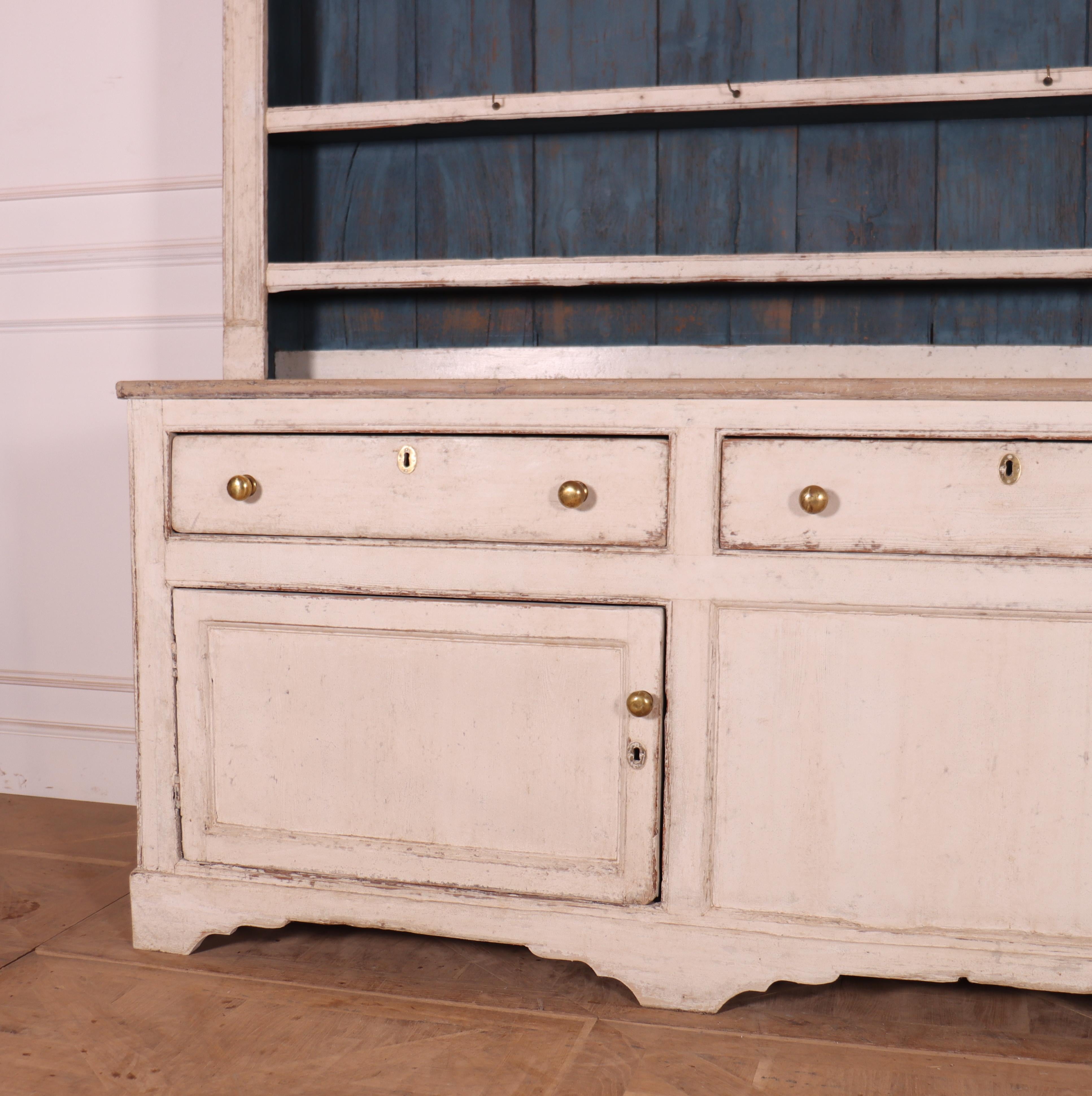 Stunning 18th Century painted pine West Country kitchen dresser. 1790.

Shelf depth is 16cm.

Dimensions
108 inches (274 cms) Wide
22.5 inches (57 cms) Deep
84.5 inches (215 cms) High.